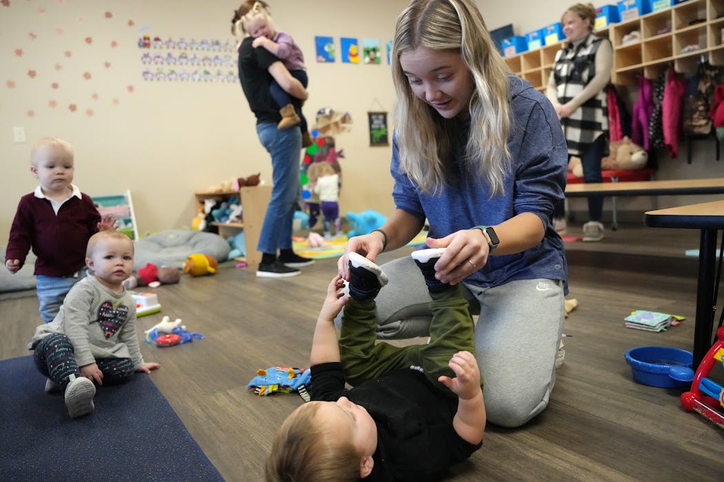Aid Gabby Knutsen played with the toddlers at the Iron Range Tykes Learning Center.