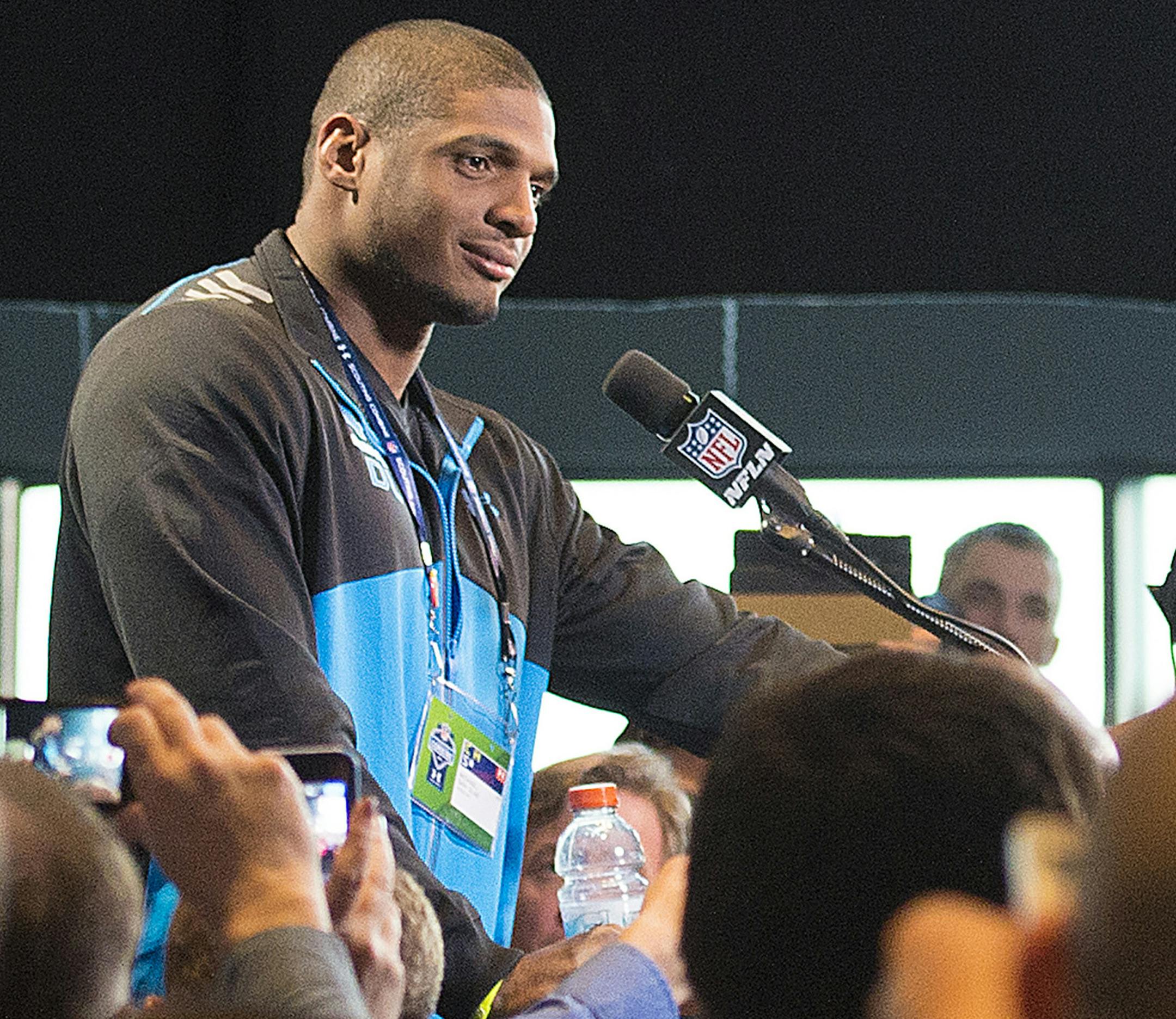 Michael Sam, a star player at University of Missouri, during a news conference at the NFL Scouting Combine at the Lucas Oil Stadium in Indianapolis, Feb. 22, 2014. Sam, Richard Sherman and Jonathan Martin are young African-American football players who represent three explosive elements in American culture -- race, class and sexual orientation -- depicting new types of athletes who break the mold of the typical NFL player. (Andrew Hancock/The New York Times)