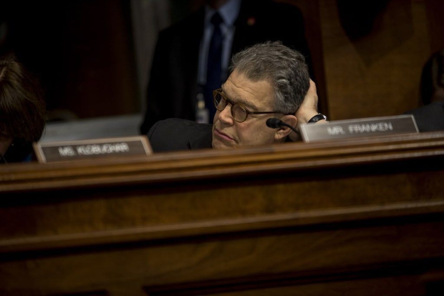 Sen. Al Franken (D-Minn.) listens as FBI Director James Comey testifies before the Senate Judiciary Committee on Capitol Hill, in Washington, May 3, 2017. Comey sharply defended on Wednesday his rationale for notifying Congress about new emails relevant to the Hillary Clinton email investigation less than two weeks before Election Day, saying any suggestion that he affected its outcome made him �mildly nauseous.�