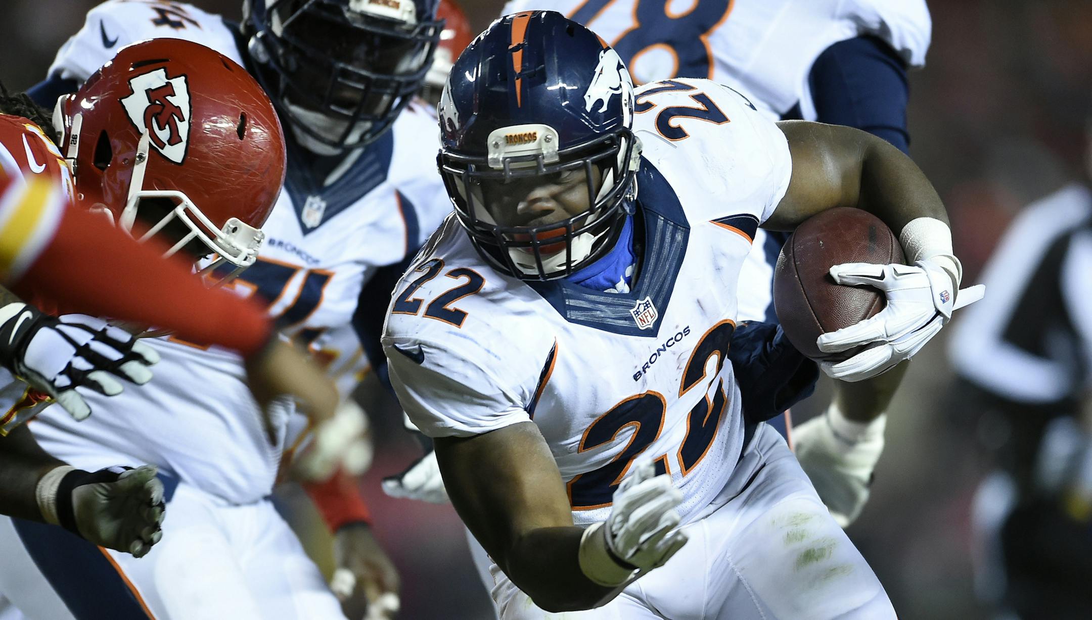 Denver Broncos running back C.J. Anderson (22) picks up four yards on a run during the first quarter on Sunday, Nov. 30, 2014, at Arrowhead Stadium in Kansas City, Mo. (David Eulitt/Kansas City Star/TNS)