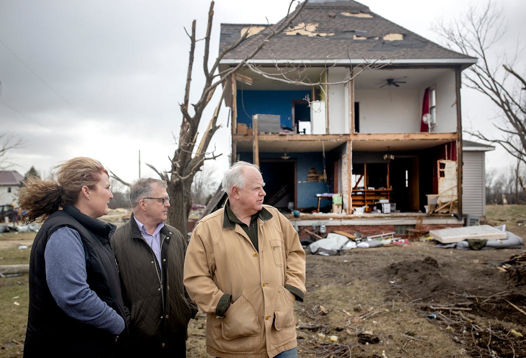 With Mower County Emergency Manager Amy Lammey and Joe Kelly, state emergency manager, Walz visited Taopi, Minn., after it was hit by a tornado in April.