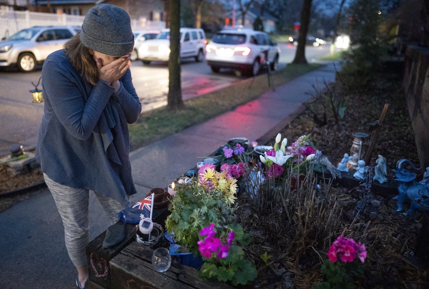 Rene Norton, a friend and neighbor of Justine Ruszczyk Damond, wiped away tears after leaving flowers on her memorial. "I'm so glad that there's justice for Justine," said Norton.