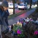 Rene Norton, a friend and neighbor of Justine Ruszczyk Damond, wiped away tears after leaving flowers on her memorial. "I'm so glad that there's justi