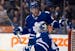 The Maple Leafs' Tyler Bozak and goaltender Jonathan Bernier celebrated after defeating the Calgary Flames on Tuesday.