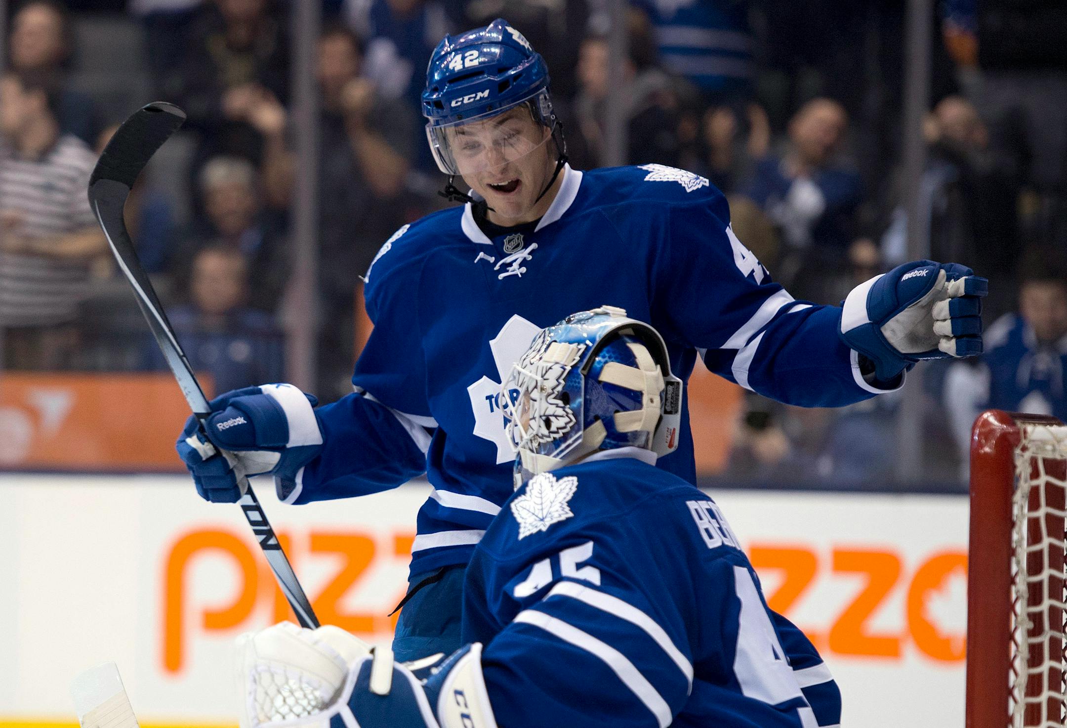 The Maple Leafs' Tyler Bozak and goaltender Jonathan Bernier celebrated after defeating the Calgary Flames on Tuesday.