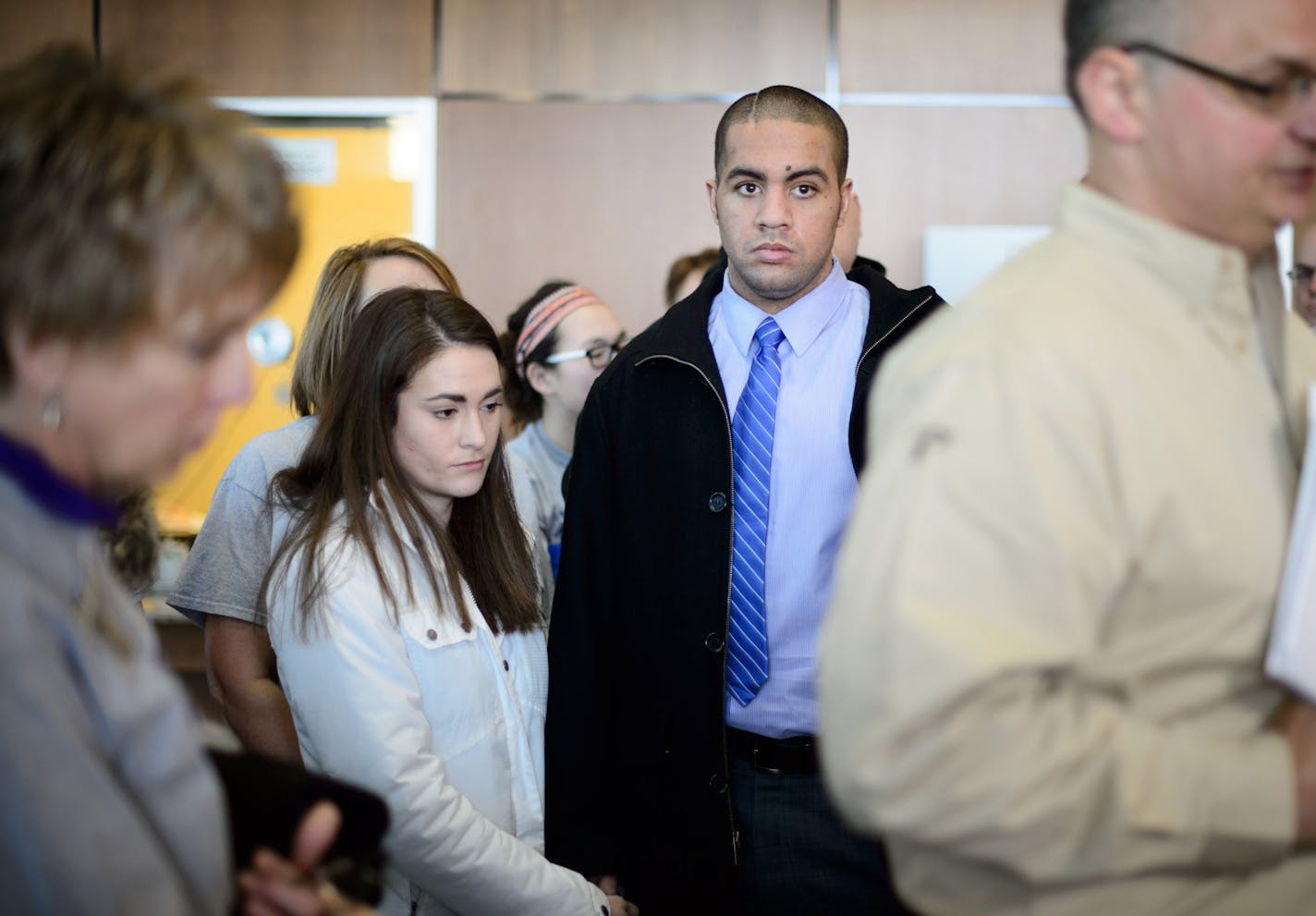 Issac Kolstad and his wife Molly listened as his father Blaine, right spoke to the media. On the left is Kolstad's mother Teresa. Earlier Philip Nelson left the Blue Earth courthouse by a side door as his attorney talked with the media. He received 100 hours of community service and no jail time in the beating of . ] GLEN STUBBE * gstubbe@startribune.com Former Minnesota quarterback Philip Nelson was sentenced Monday for his role in the bar-closing time assault on Issac Kolstad.