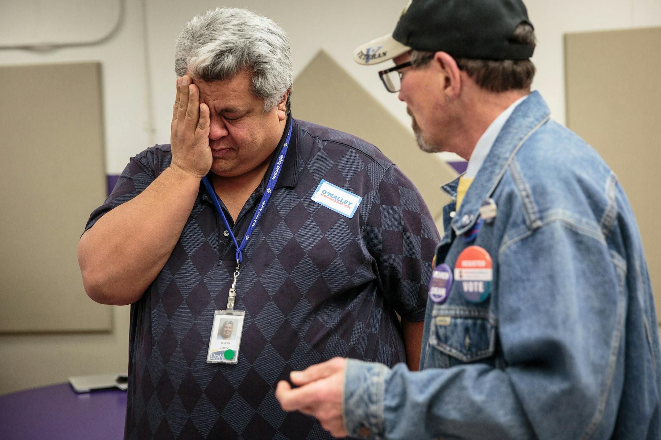 David Lopez, a supporter of Martin O&#x2019;Malley, under stress as a precinct captain for Bernie Sanders tries to persuade him to caucus for the Vermont senator, in Indianola, Iowa, Feb. 1, 2016. Forced to re-assign upon not meeting a 15 percent threshold, most of O'Malley's supporters here wound up caucusing for Hillary Clinton. (Max Whittaker/The New York Times)