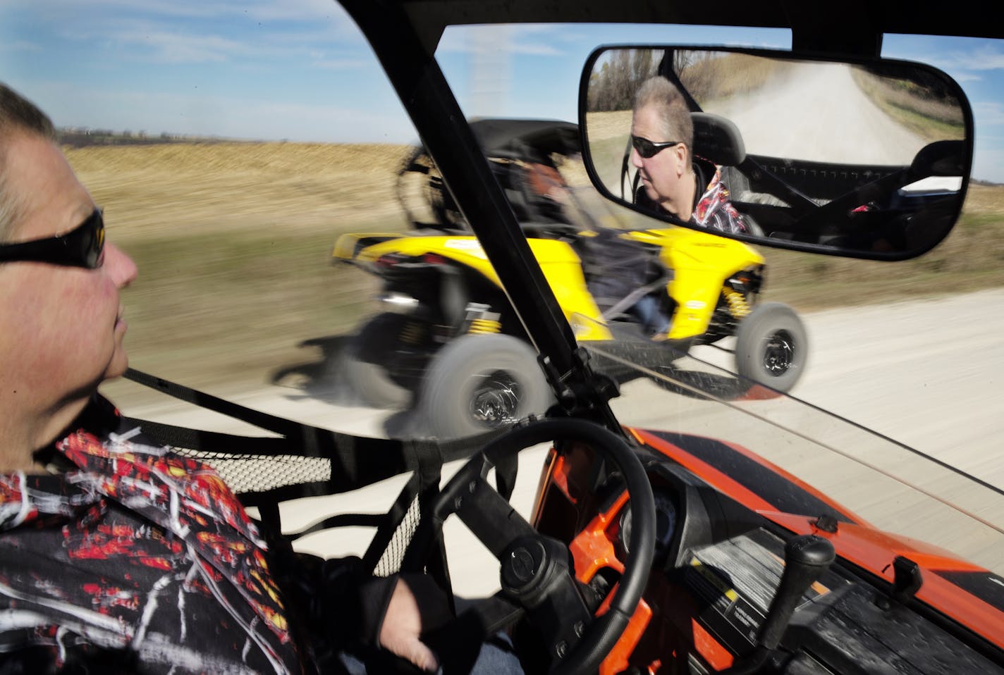 Scott Theobald rides his Polaris ATV In Wabasha County with a pack of friends. He was instrumental in implementing a law that regular not just side-by-side ATV's could be ridden on county roads.]Richard Tsong-Taatarii/rtsong- taatarii@startribune.com ORG XMIT: MIN1411031349383565