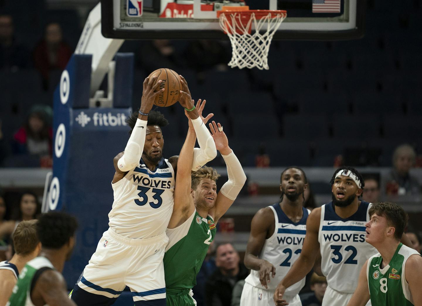 Timberwolves forward Robert Covington grabbed a defensive rebound with authority in Sunday night's game. He is returning from a knee injury last season.