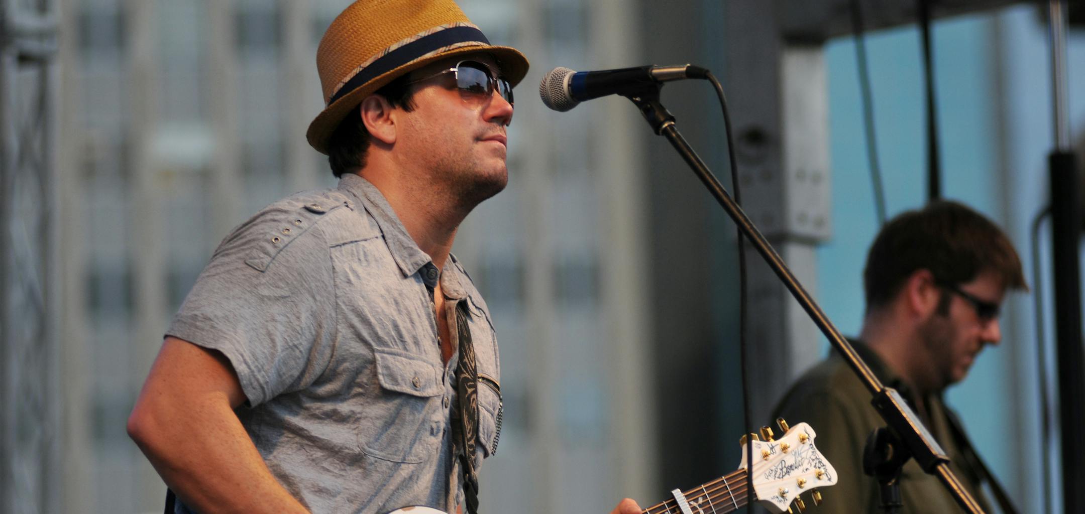 Tim Mahoney performed first at the annual Aquatennial Block Party held on Nicolette Mall July 15, 2011 in downtown Minneapolis. Crowds filtered in slowly despite constant light rain during the first band.] (Leah Millis &#x201a;&#xc4;&#xa2; leah.millis@startribune.com) ORG XMIT: MIN2013071818060012