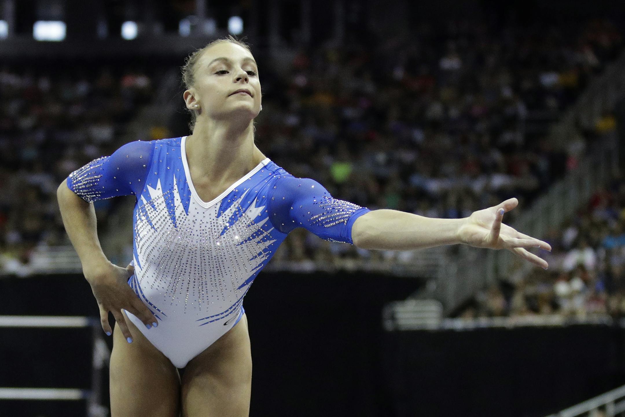 Grace McCallum competes in the floor exercise during the senior women's competition at the 2019 U.S. Gymnastics Championships Sunday, Aug. 11, 2019, in Kansas City, Mo. McCallum finished third in the all-around. (AP Photo/Charlie Riedel)