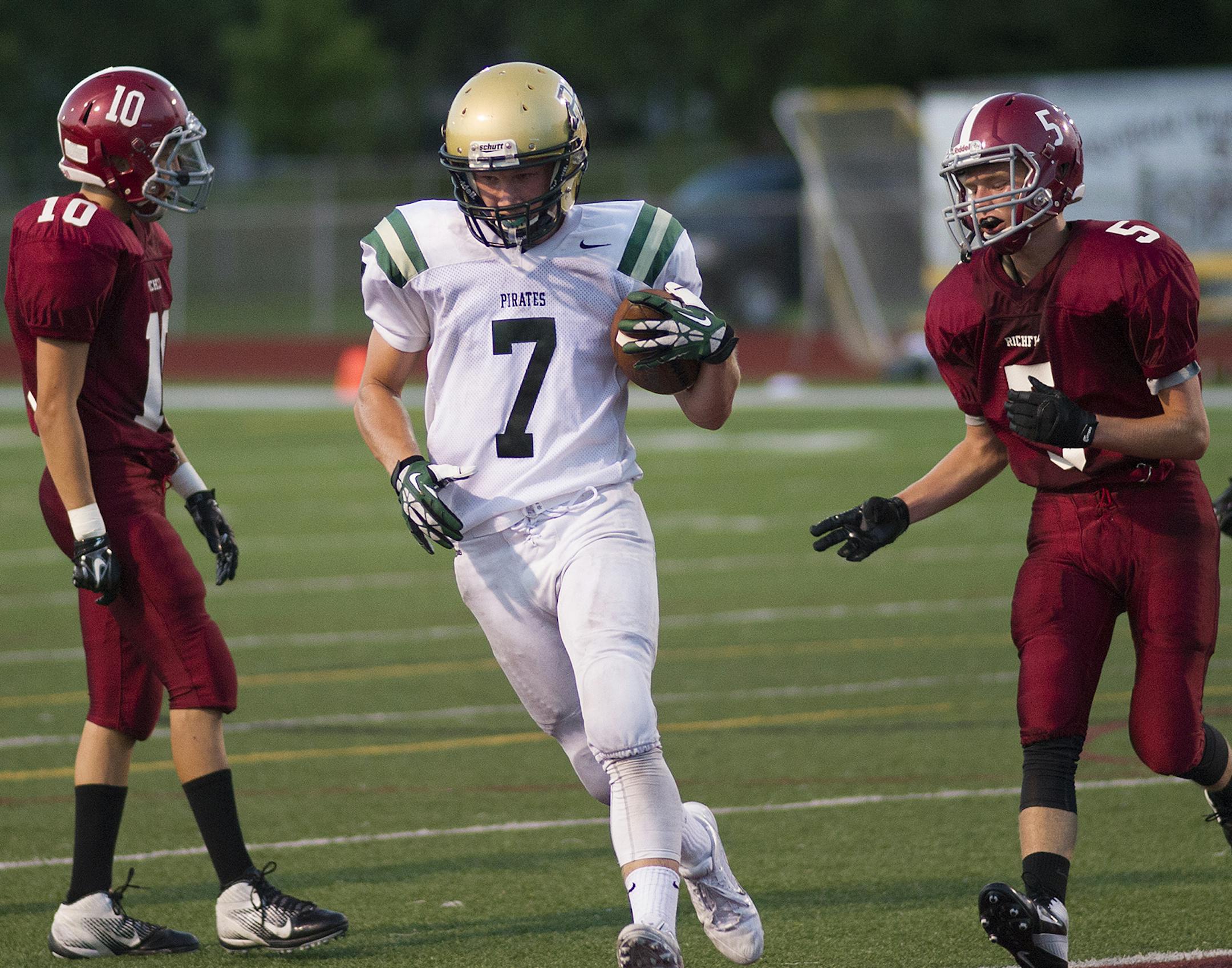 Park Center's Adam Buirge brings it in for a touchdown. ] (Matthew Hintz, 082214, Richfield)