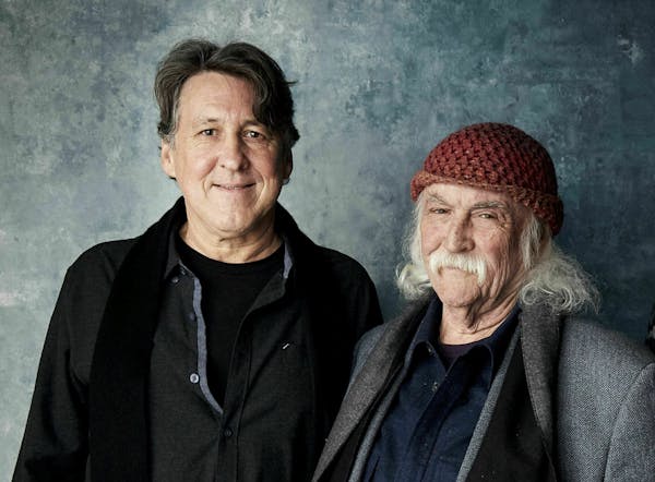 FILE - In this Jan. 26, 2019 photo, producer Cameron Crowe, from left, David Crosby and director A.J. Eaton pose for a portrait to promote the film "D