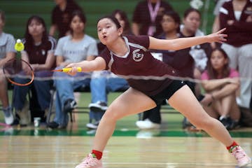 St. Paul Johnson's Su Meh defeats St. Paul Hardinbg's Gaozhia Vue for the badminton singles state championship Thursday in Edina.