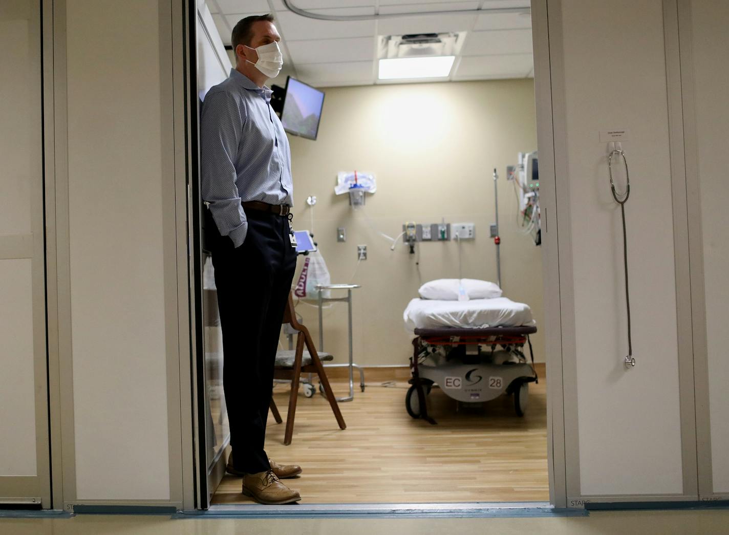 Brent Walters, MD, critical care and emergency medicine physician, in a patient room during a Park Nicollet Methodist Hospital COVID-19 Emergency Room tour Thursday, June 4, 2020, in St. Louis Park, MN.] DAVID JOLES • david.joles@startribune.com Hospitals are urging people with medical emergencies to go to the ER again, but will anyone actually go? We're visiting hospital emergency departments in the Twin Cities this week to get a first-hand look at the infection-control measures in place to kee