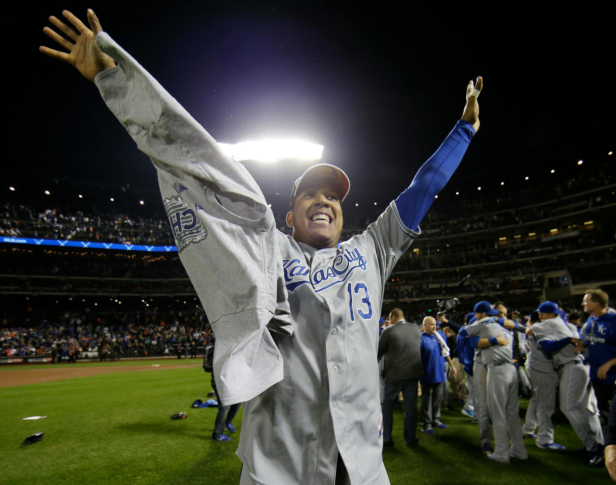 Kansas City Royals catcher Salvador Perez celebrates after being named the MVP after Game 5 of the Major League Baseball World Series against the New York Mets Monday, Nov. 2, 2015, in New York. The Royals won 7-2 to win the series. (AP Photo/Matt Slocum)