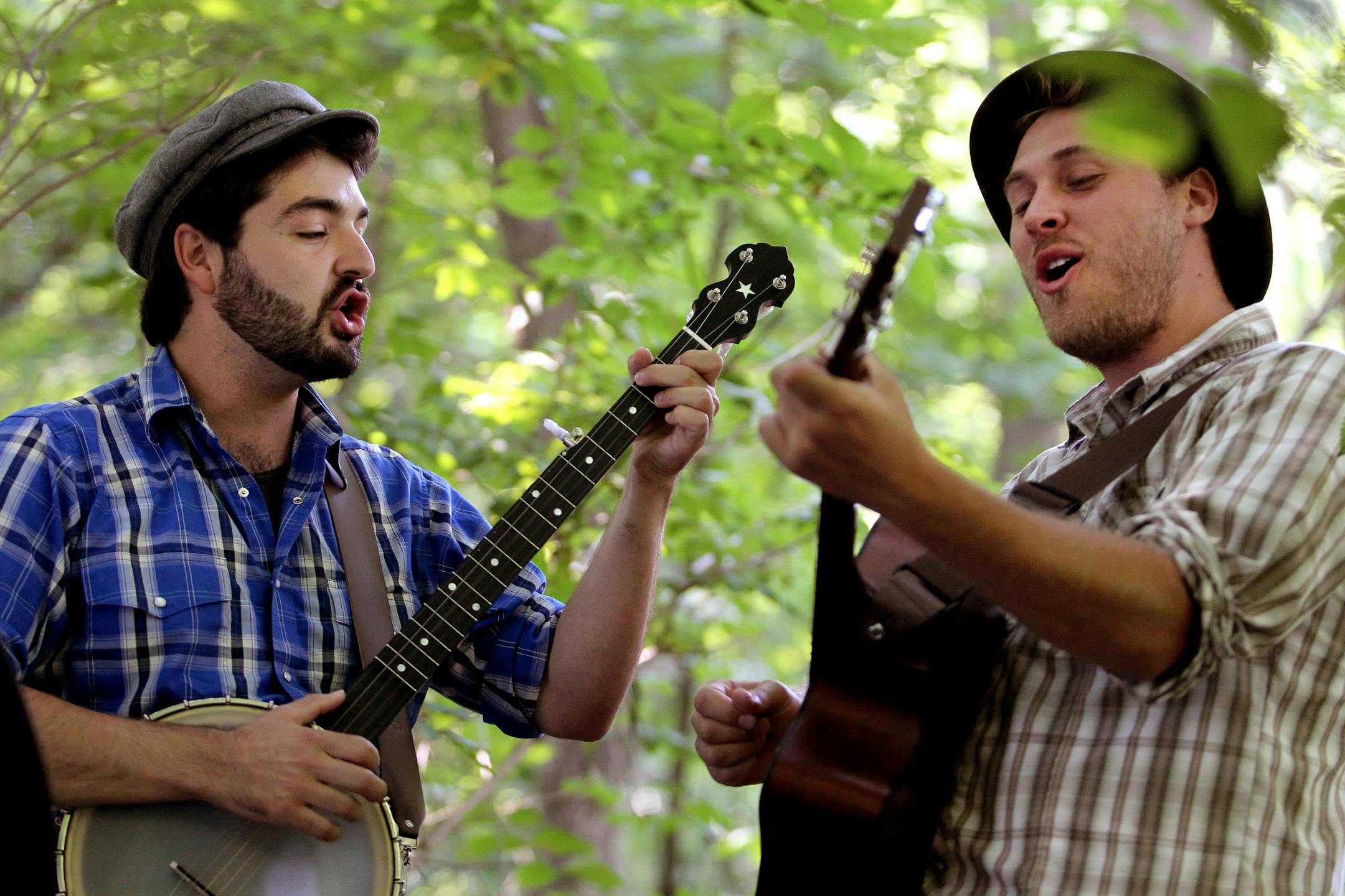 The Okee Dokee Brothers, Justin Lansing, left, and Joe Mailander, pose for a portrait at Theodore Wirth Park in Minneapolis, Minn.
