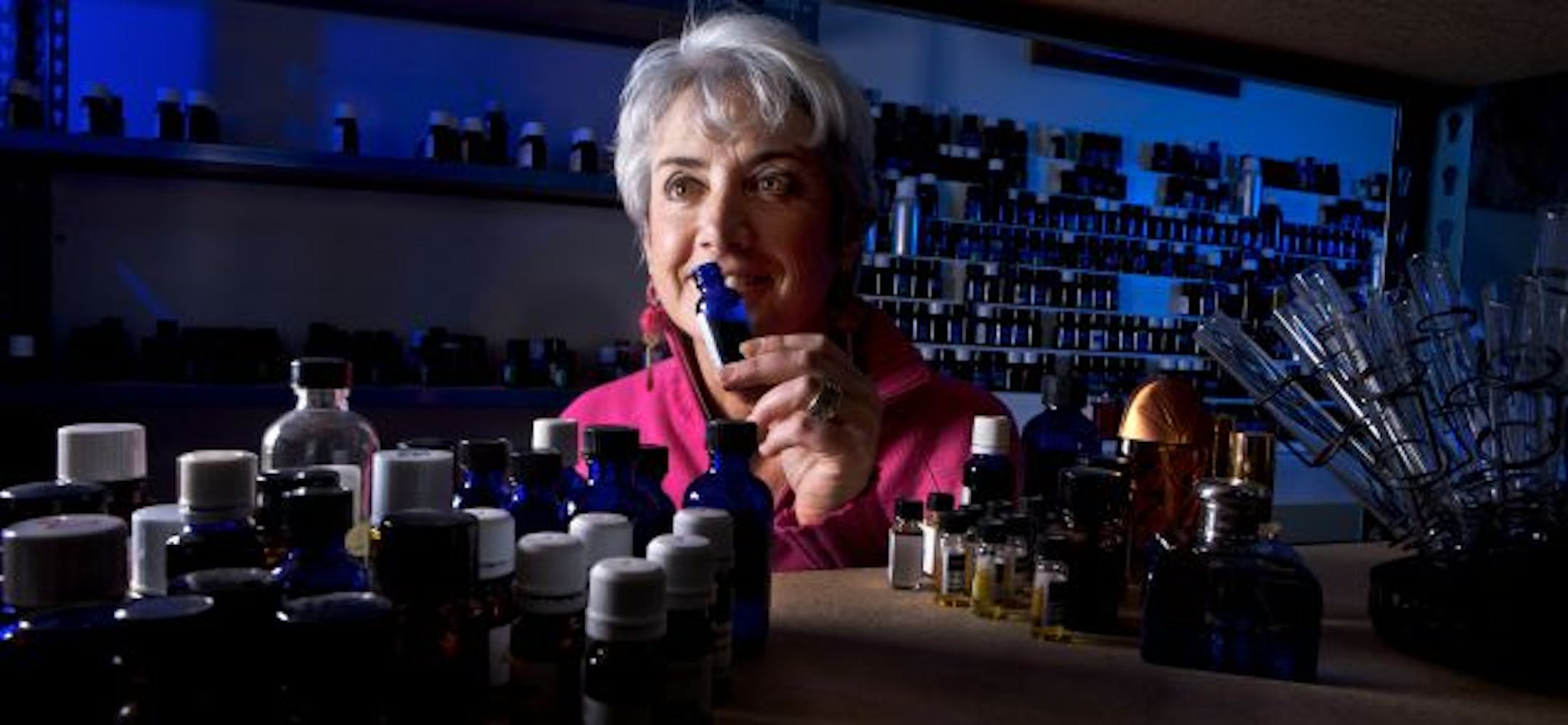 Eileen Kenney, co-owner of AromaSys in Lake Elmo, in her lab. The company sells aroma systems to hotels, spas and other businesses.