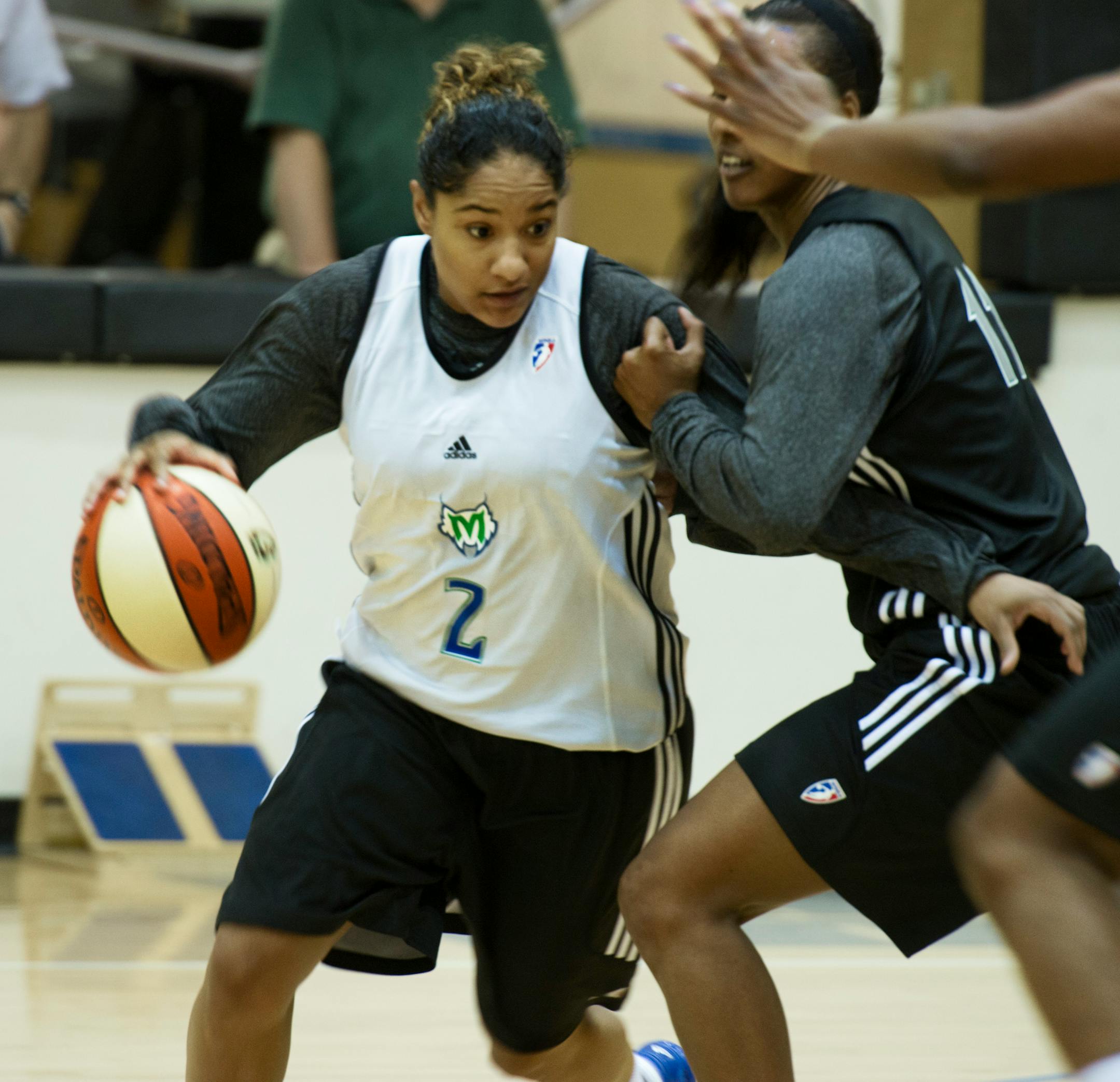 Former St. Paul Central star Angel Robinson drove past teammate Candice Wiggins during practice as the Lynx prepared for Tuesday's exhibition game vs. Indiana at Concordia (St. Paul).