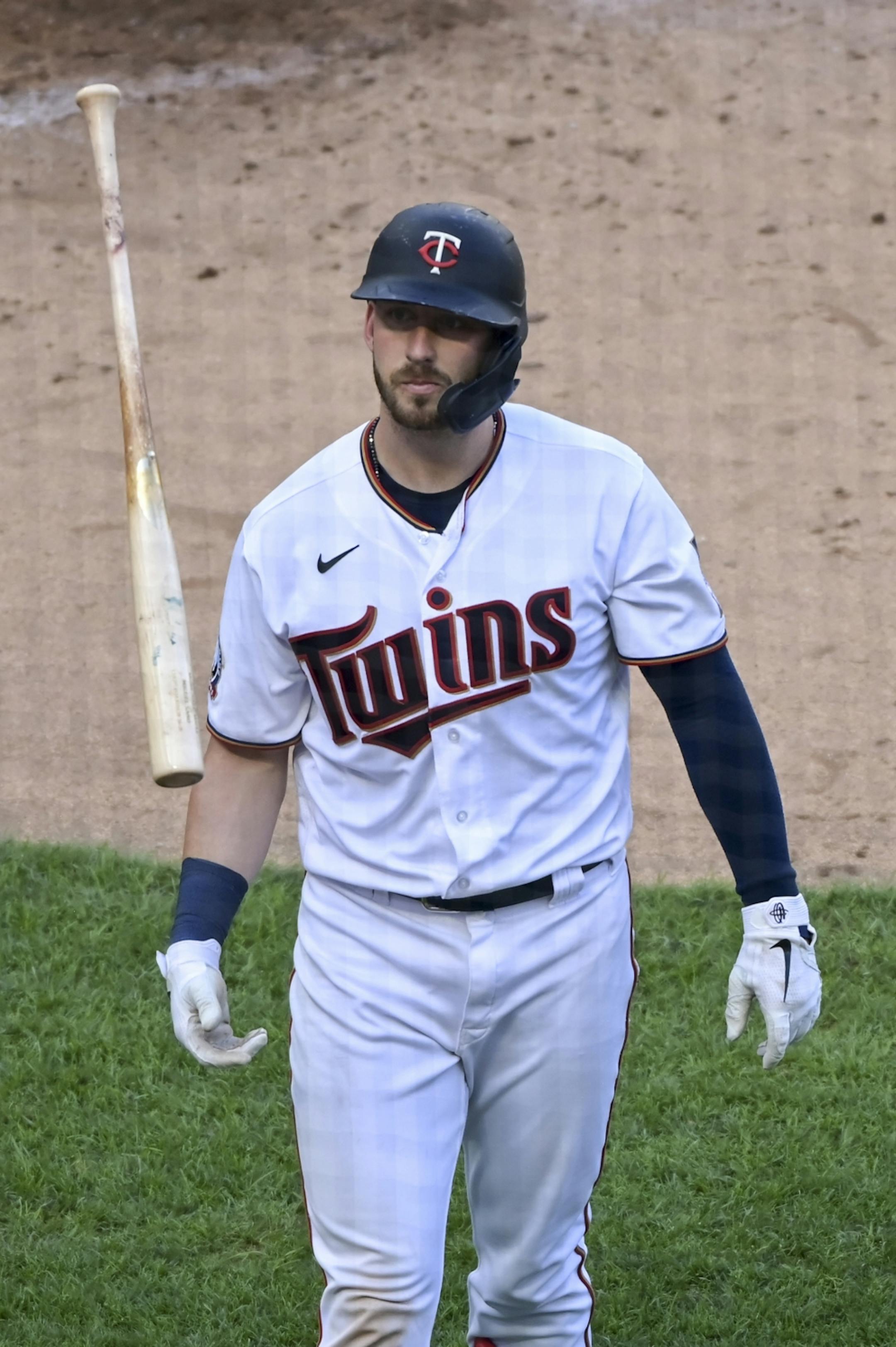 Minnesota Twins catcher Mitch Garver flipped his bat after being struck out swinging in the bottom of the third inning against the Kansas City Royals.