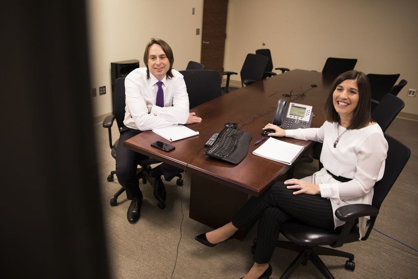 Kathryn Nash, right, works on a series of videos with colleague Stephen Vaughan to help educate college students and staff about sexual assault.