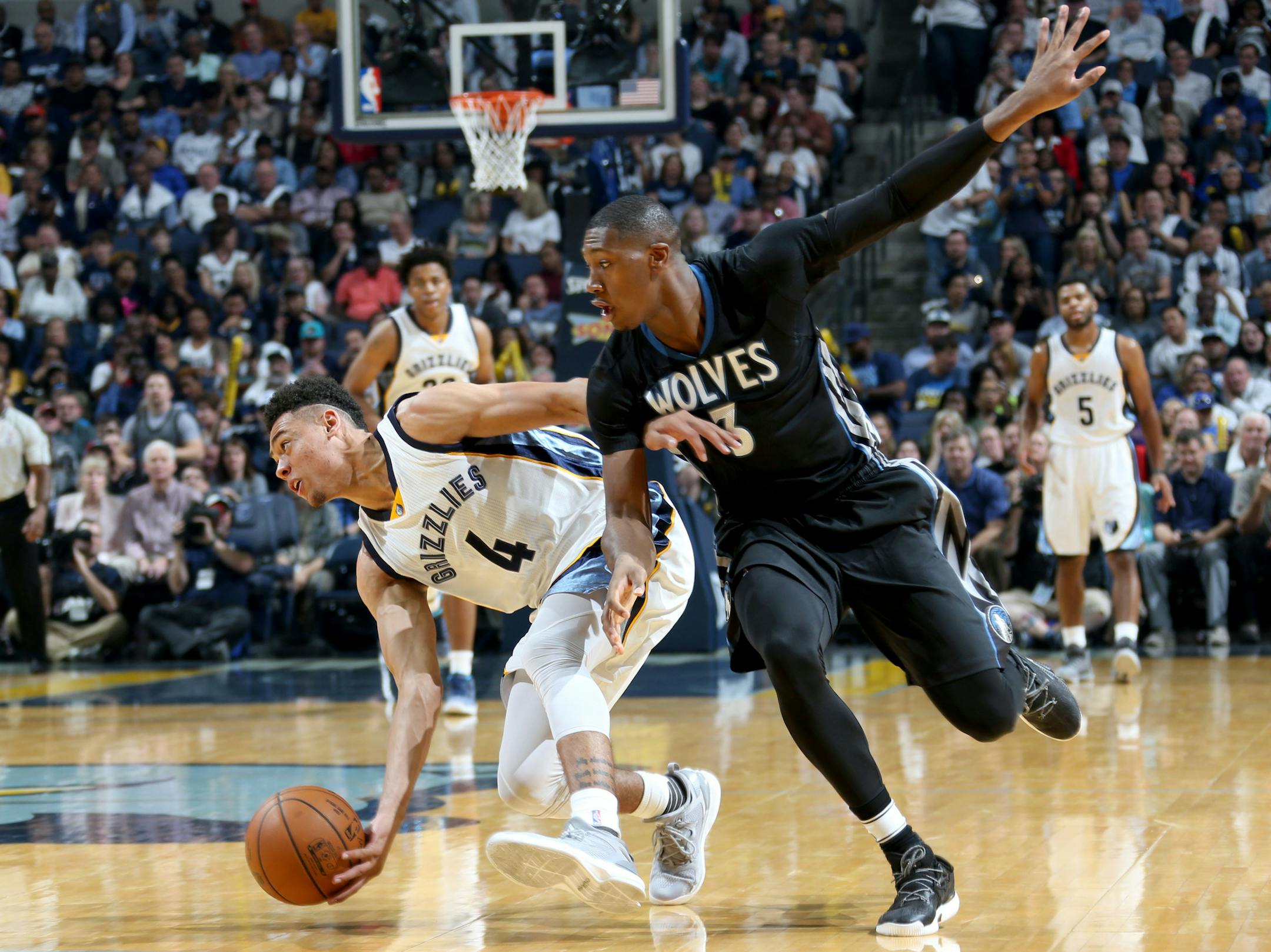 Memphis Grizzlies Wade Baldwin IV scoops up a loose ball defended by Minnesota Timberwolves Kris Dunn, Wednesday, Oct. 26, 2016. Nikki Boertman/The Commercial Appeal (Memphis)