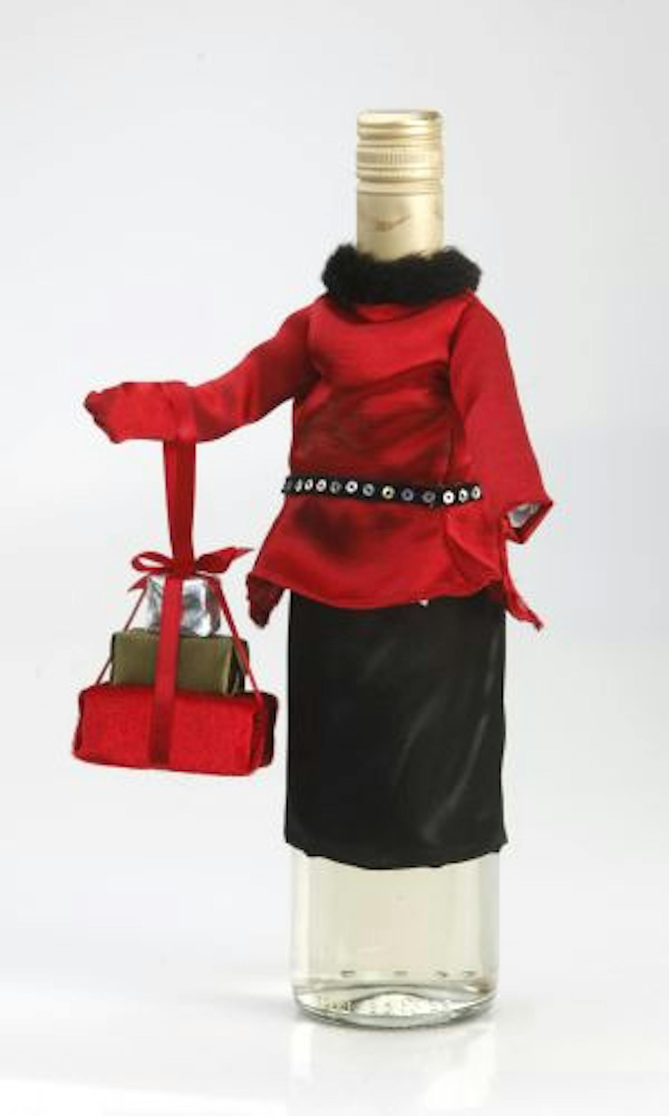 No matter the occasion, wine is the perfect accessory. Wine bottle styling by Stacey Leneave.