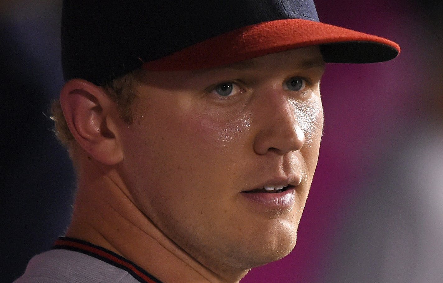 Minnesota Twins starting pitcher Tyler Duffey stands in the dugout after being taken out of the game during the fifth inning of a baseball game against the Los Angeles Angels, Wednesday, June 15, 2016, in Anaheim, Calif. (AP Photo/Mark J. Terrill)