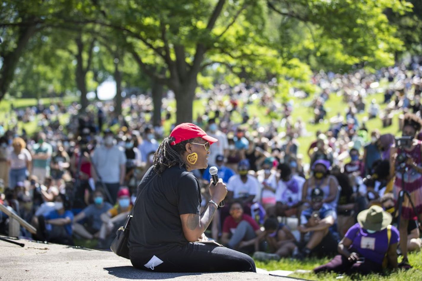 Andrea Jenkins vice president of the Minneapolis City Council spoke to community members at "The Path Forward" meeting at Powerhorn Park, a meeting between Minneapolis City Council and community members.