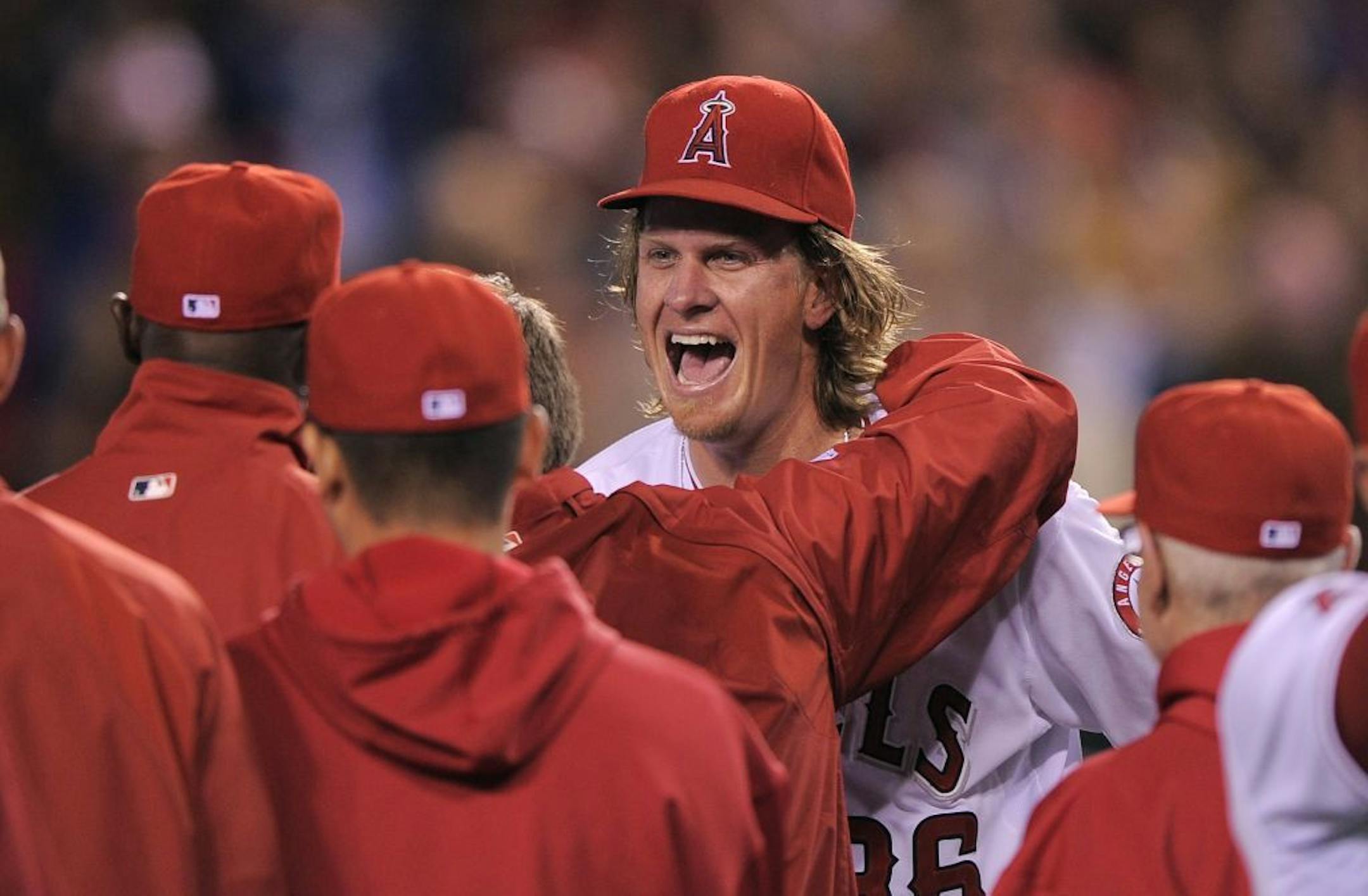 Los Angeles Angels starting pitcher Jered Weaver celebrates with teammates after pitching a a no-hitter in their baseball game against the Minnesota Twins, Wednesday, May 2, 2012, in Anaheim, Calif. The Angels won 9-0.