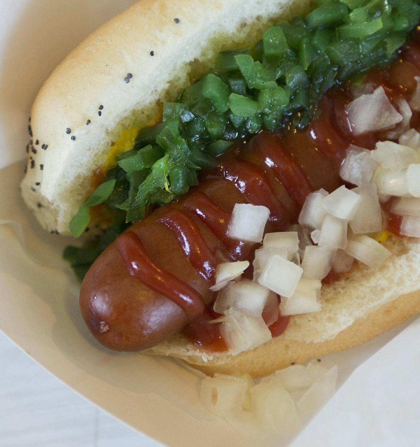 Uncle Franky Dog from Uncle Franky's is a classic hot dog with bright-green relish, onions, mustard and ketchup.