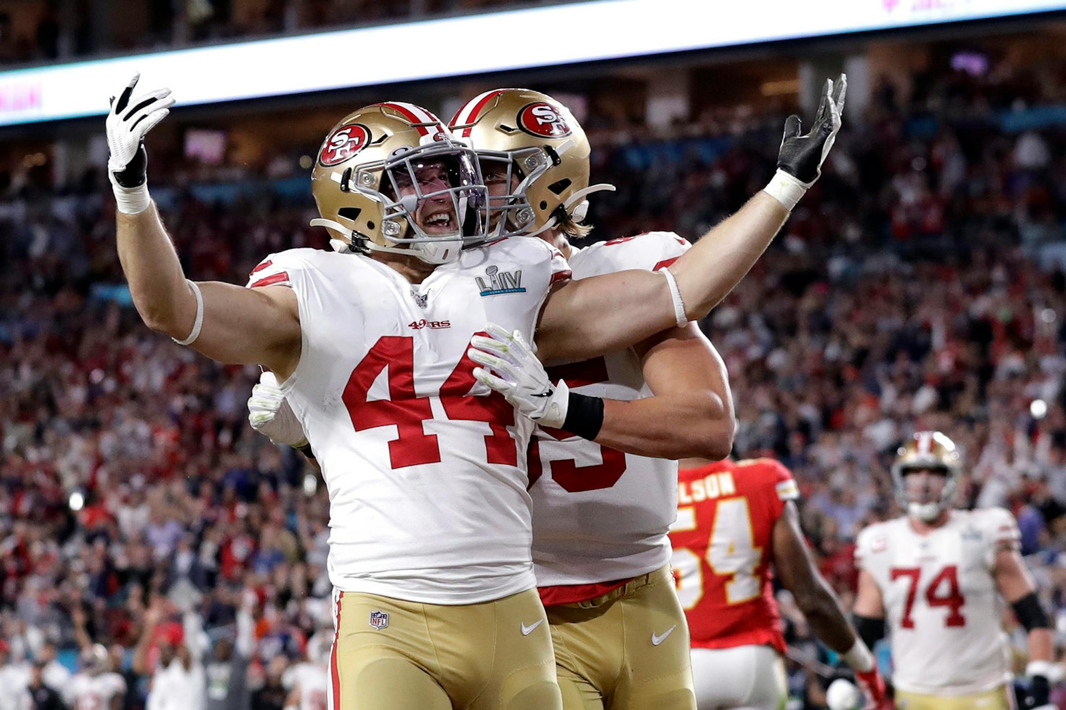 San Francisco 49ers' Kyle Juszczyk (44) celebrates his touchdown the Kansas City Chiefs during the first half of the NFL Super Bowl 54 football game Sunday, Feb. 2, 2020, in Miami Gardens, Fla.