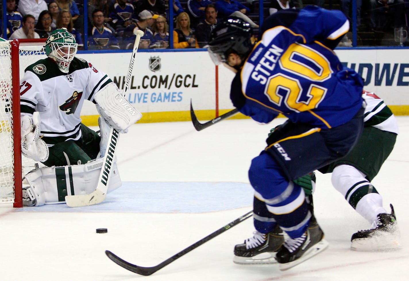 Minnesota Wild goalie Josh Harding blocks a shot on goal from St. Louis Blues' Alexander Steen during the second period of a preseason NHL hockey game Friday, Sept. 27, 2013, in St. Louis. (AP Photo/Scott Kane)