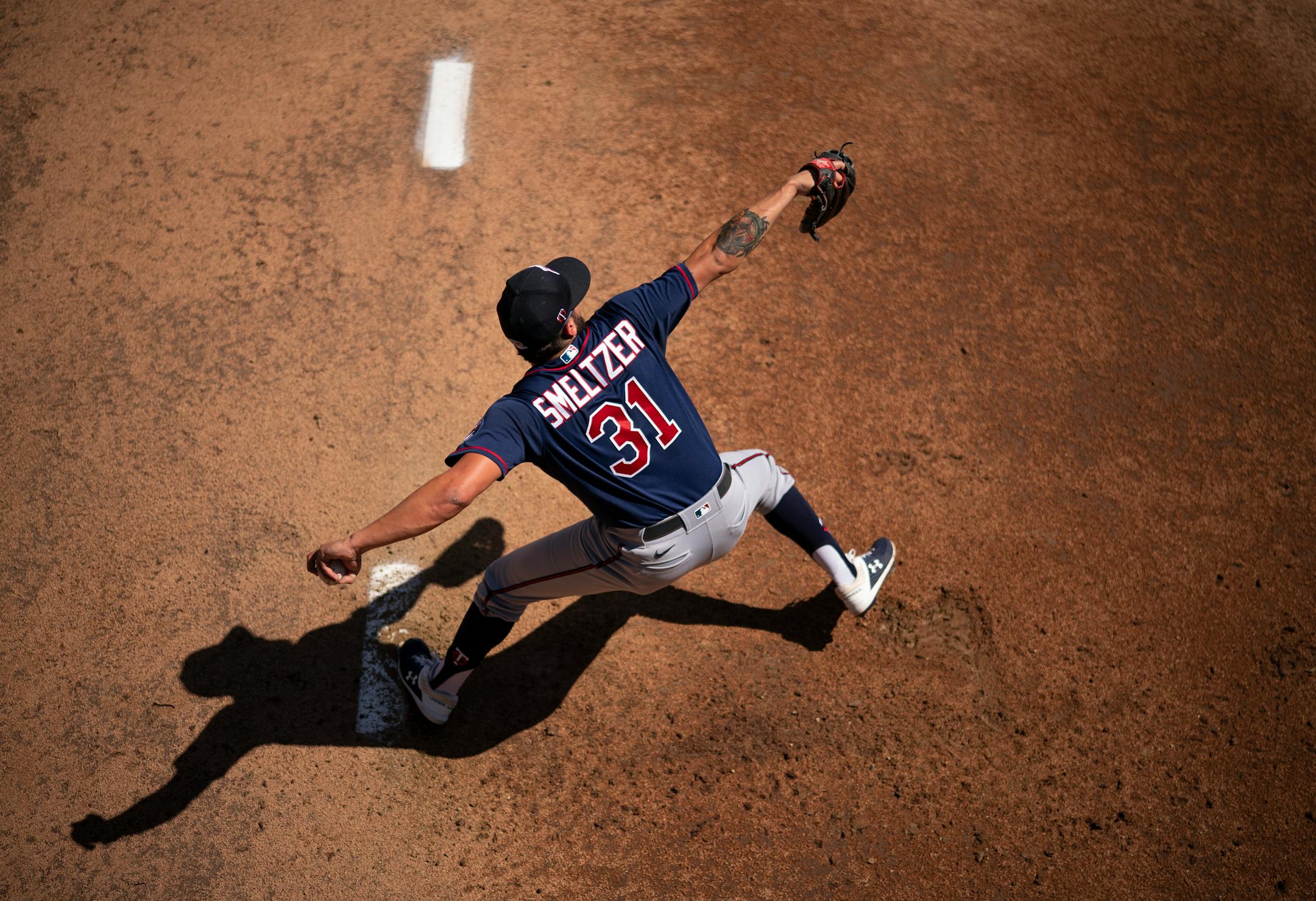 Minnesota Twins pitcher Devin Smeltzer threw in the bullpen during Tuesday's first full squad workout.