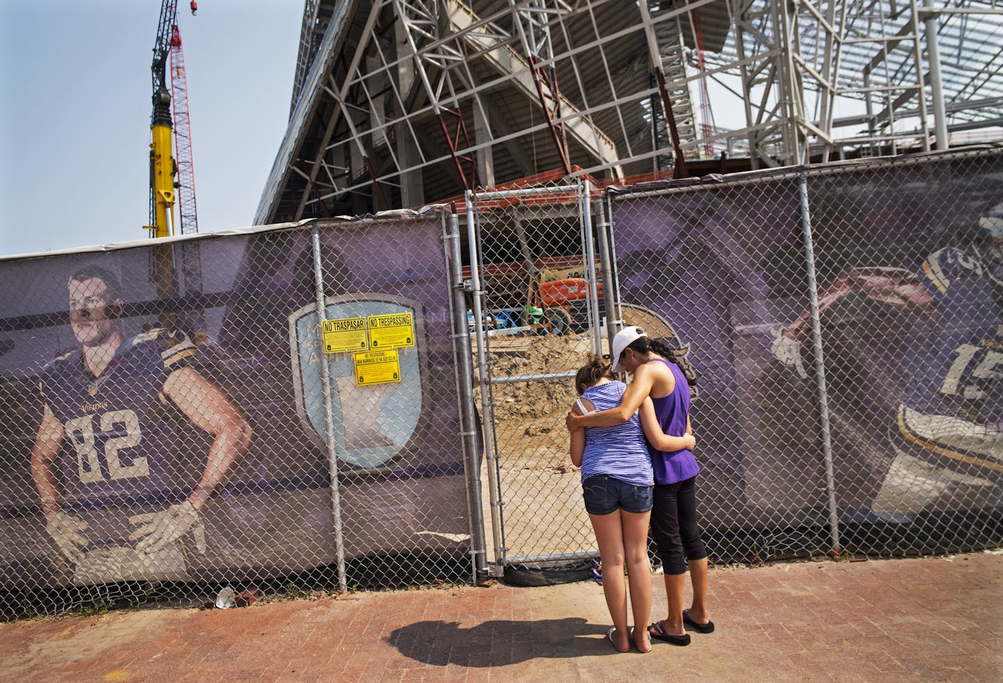 At U.S. Bank Stadium, one worker was killed and another injured in a construction site accident Wednesday morning. Angela Strong and daughter Kyra,11, of St. Paul brought a bouquet of flowers and said prayers for the construction workers.