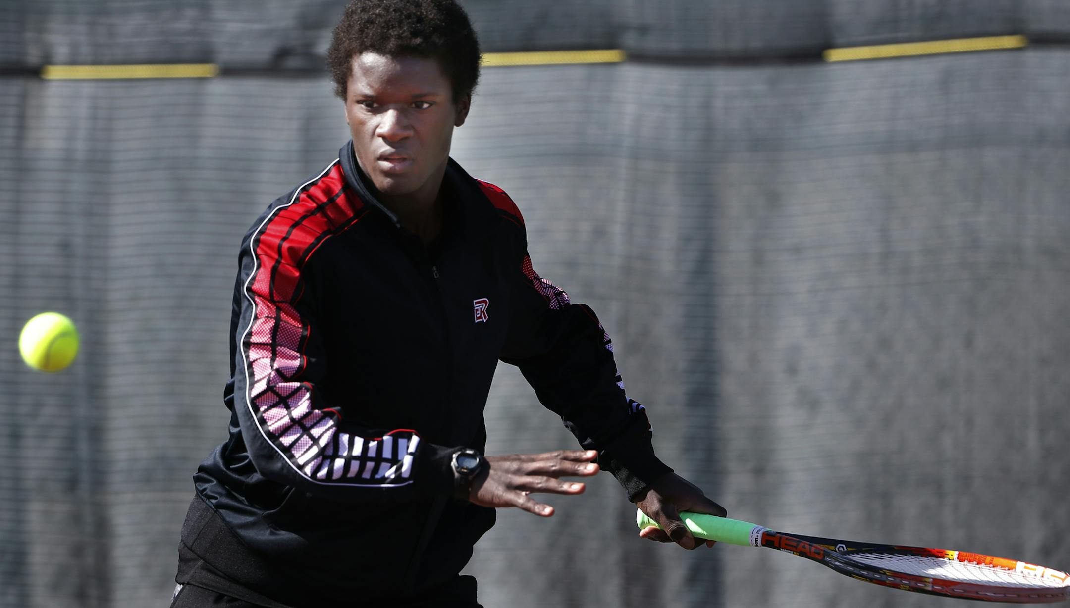 Sam Gearou, pictured, and twin brother Josh have been winning varsity tennis matches and assaulting the Elk River record books since seventh grade.
