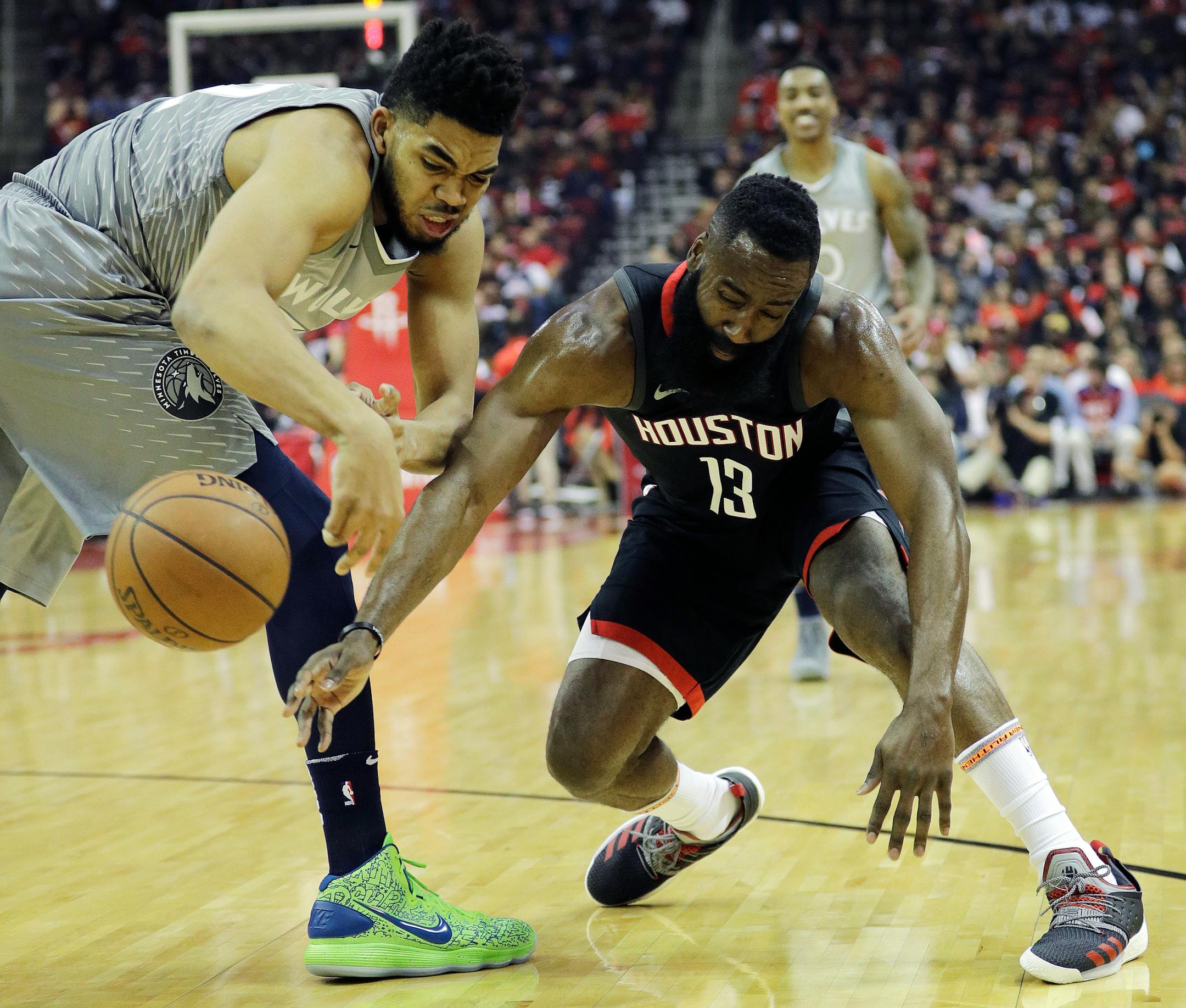 Wolves center Karl-Anthony Towns made 42.1 percent of his three-point attempts during the regular season — a stat well known to James Harden, right, and the Rockets leading into Game 1 Sunday.