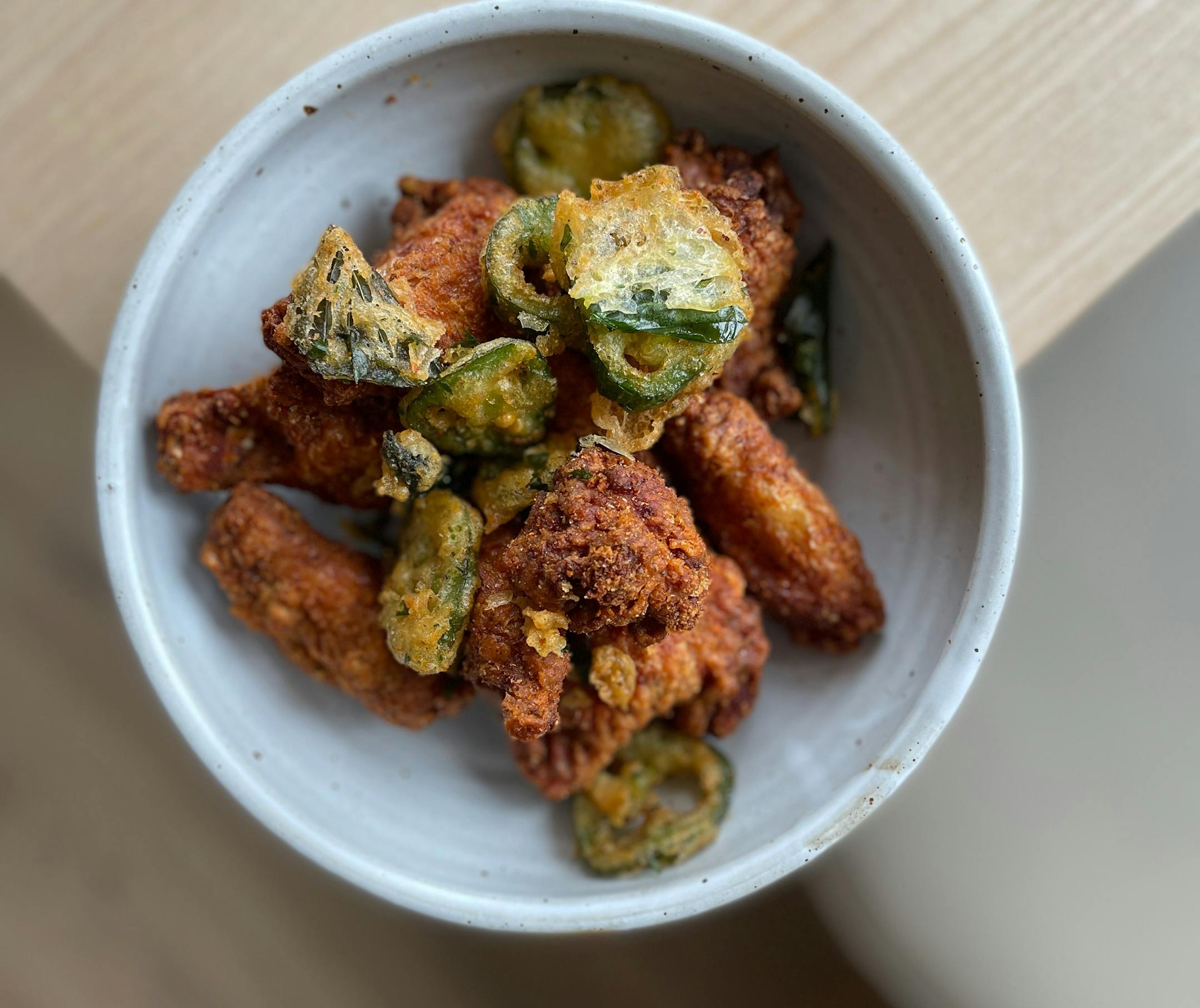 Thai basil wings are on the menu at all three of Ann Ahmed's restaurants -- Khaluna, Lat14 and Lemon Grass. Joy Summers, Star Tribune