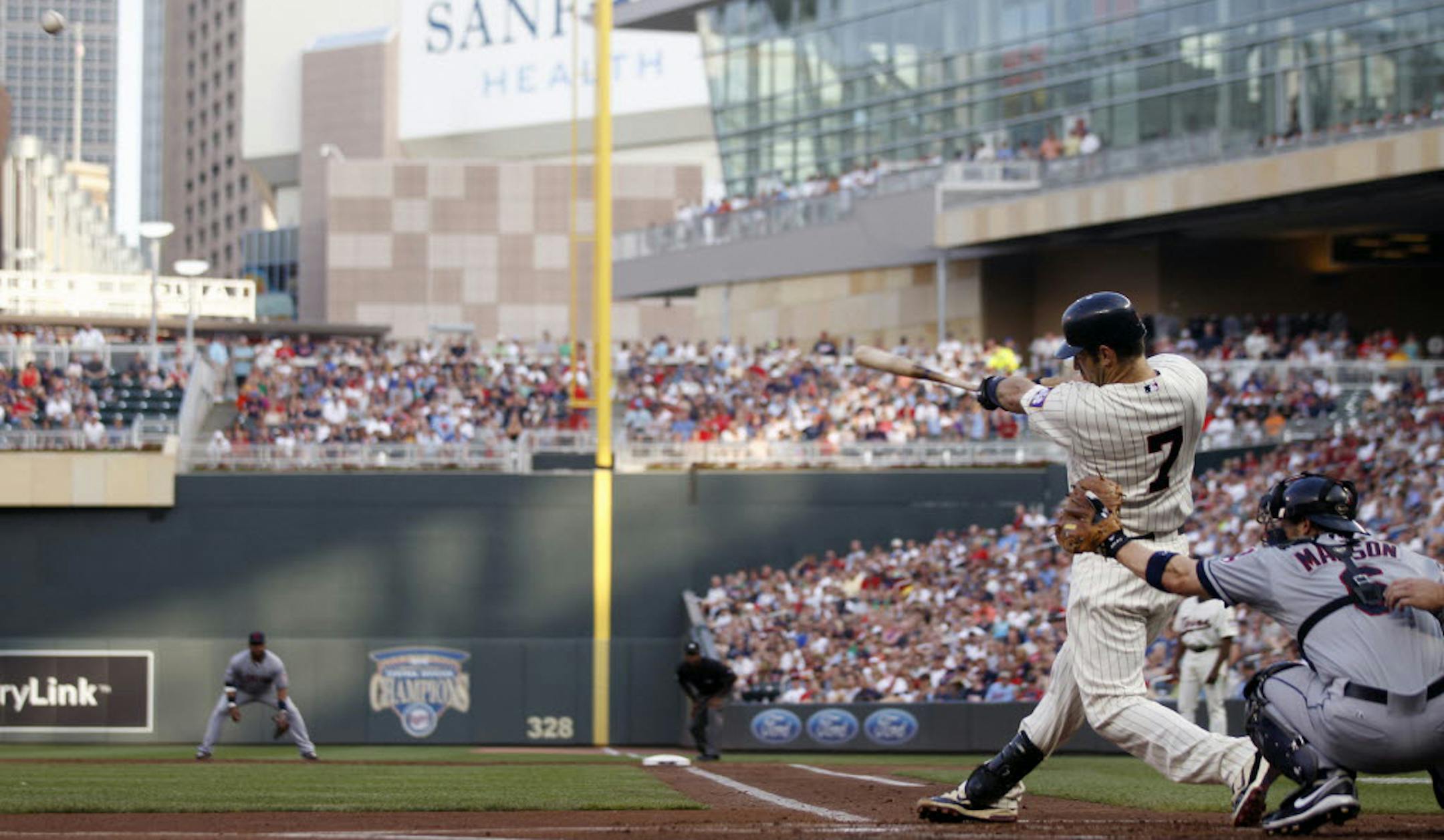 Joe Mauer hits a double to left field in the bottom of the first inning.