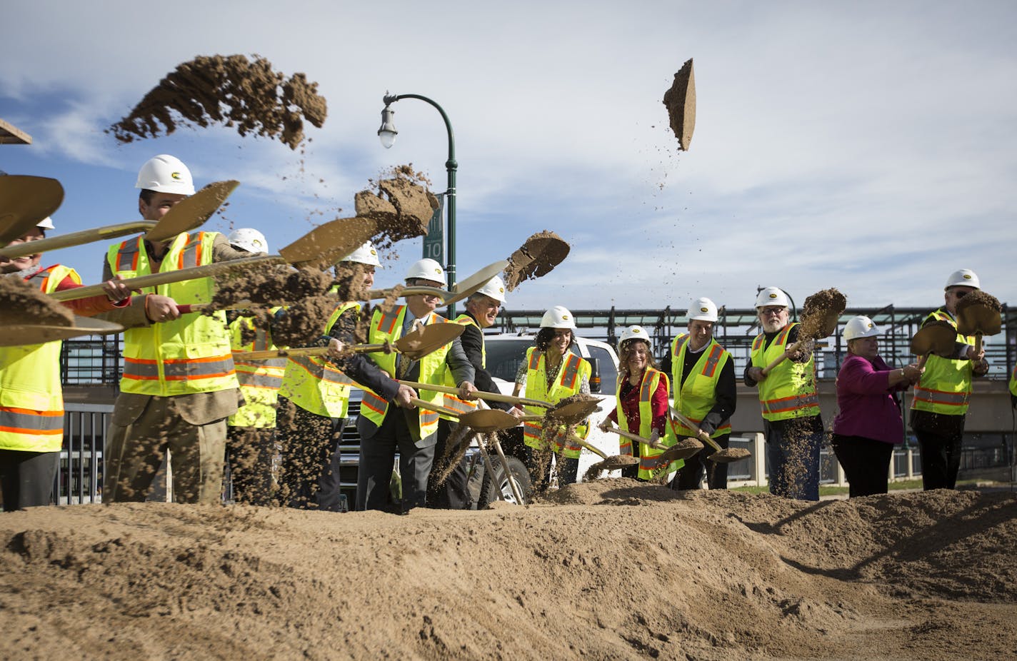 Officials broke ground on a project that promises to overhaul an intersection now seen as one of the biggest missed opportunities for development along the Hiawatha Blue Line during a ground breaking ceremony in Minneapolis, Minn., on Monday, November 2, 2015.