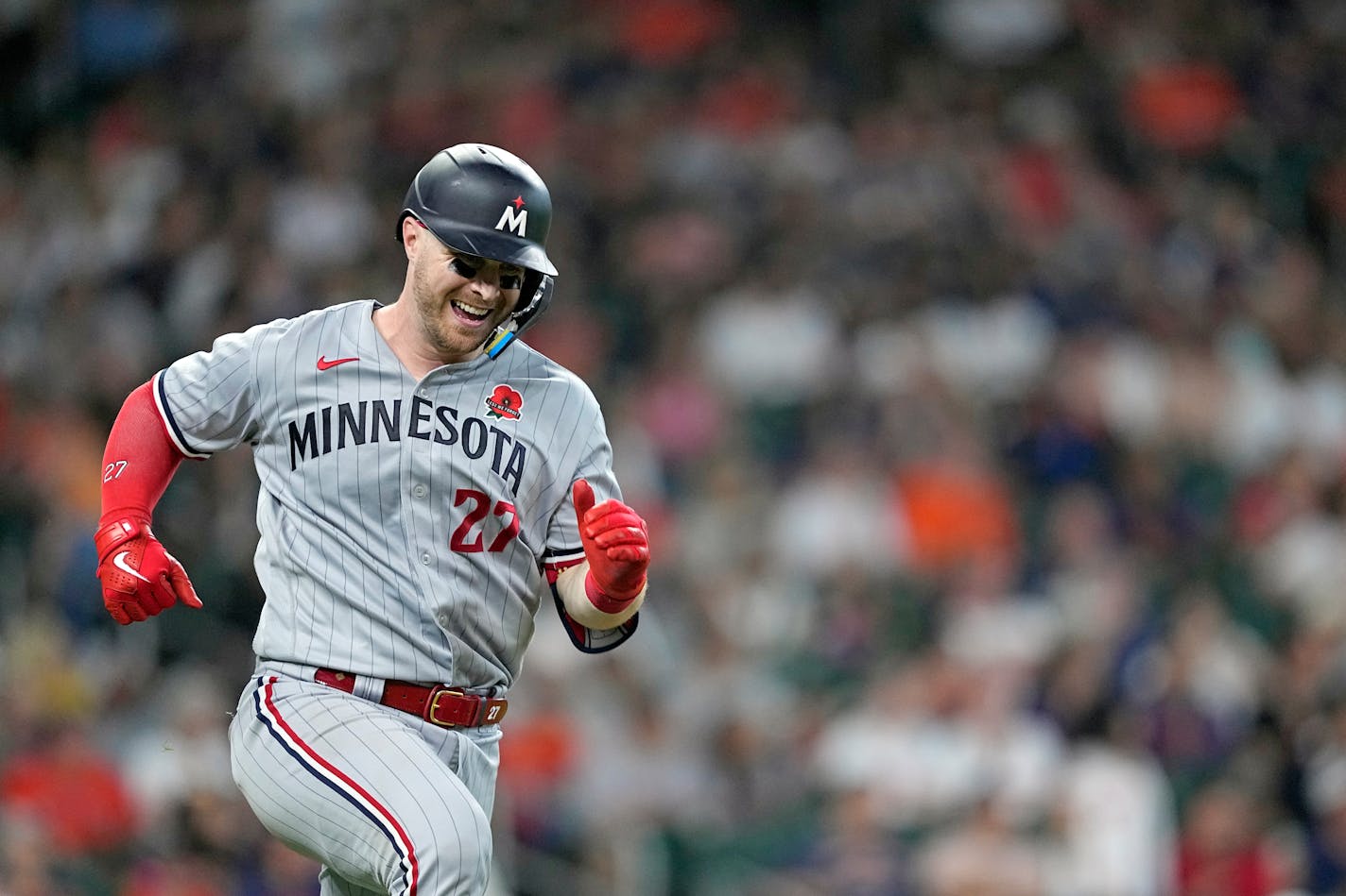 Minnesota Twins' Ryan Jeffers celebrates after hitting a home run against the Houston Astros during the 10th inning of a baseball game Monday, May 29, 2023, in Houston. (AP Photo/David J. Phillip)