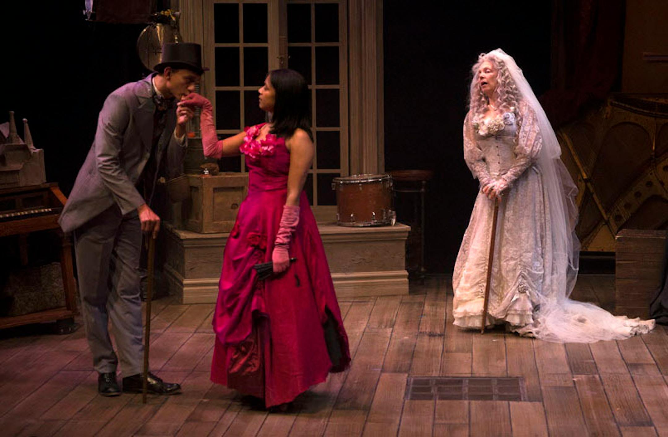 Ryan Colbert as Pip, Hope Cervantes as Estella and Barbra Berlovitz as Miss Havisham.