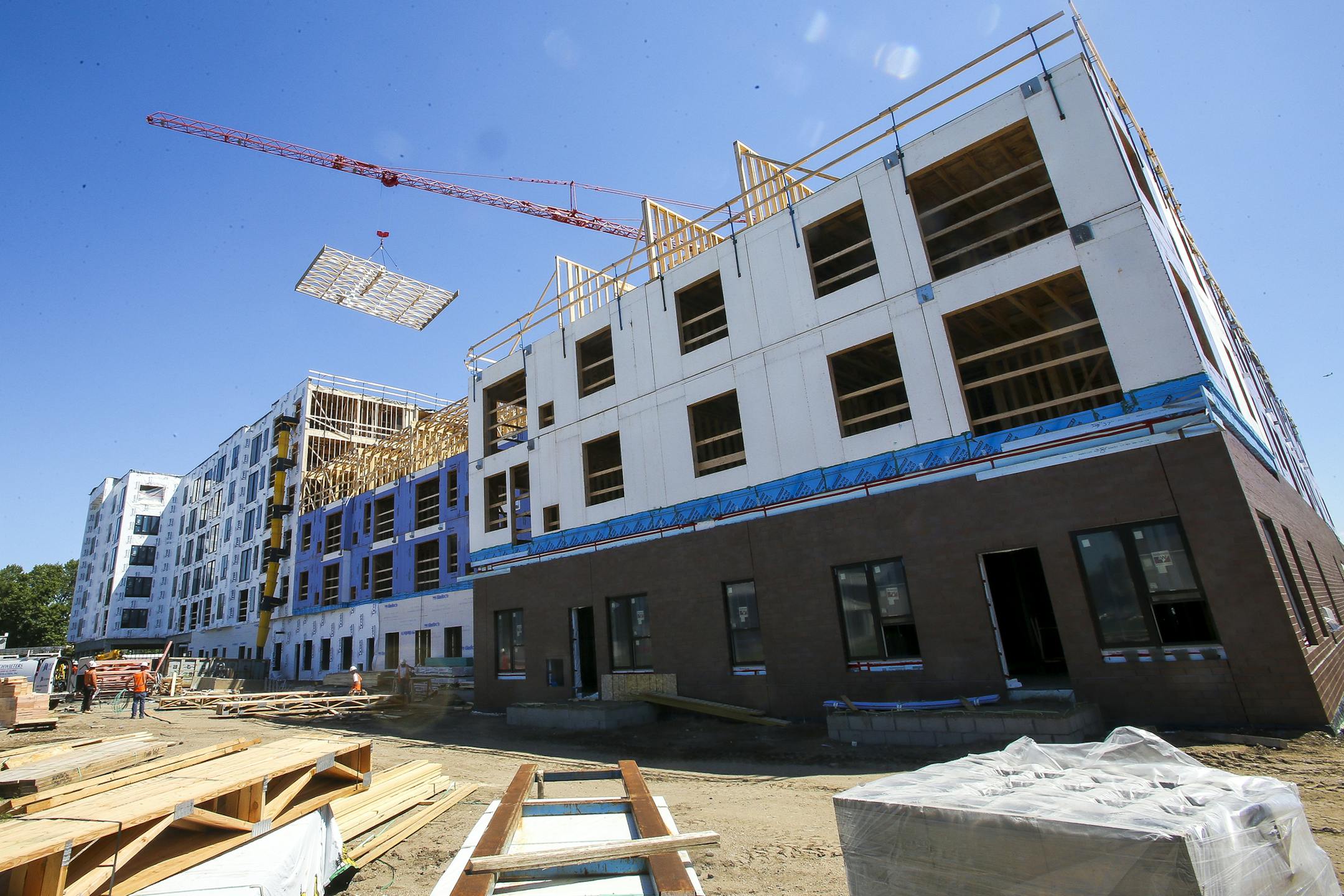 The developer of Hello Apartments, a 172-unit complex in Golden Valley that was supposed to be completed in December fired its contractor Thursday after executives said they weren't confident about a plan to replace framing lumber that didn't meet fire code.
