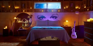 The photo featured in Airbnb's ad for the Purple Rain House shows a basement bedroom fashioned after the one seen in Prince's 1984 movie.