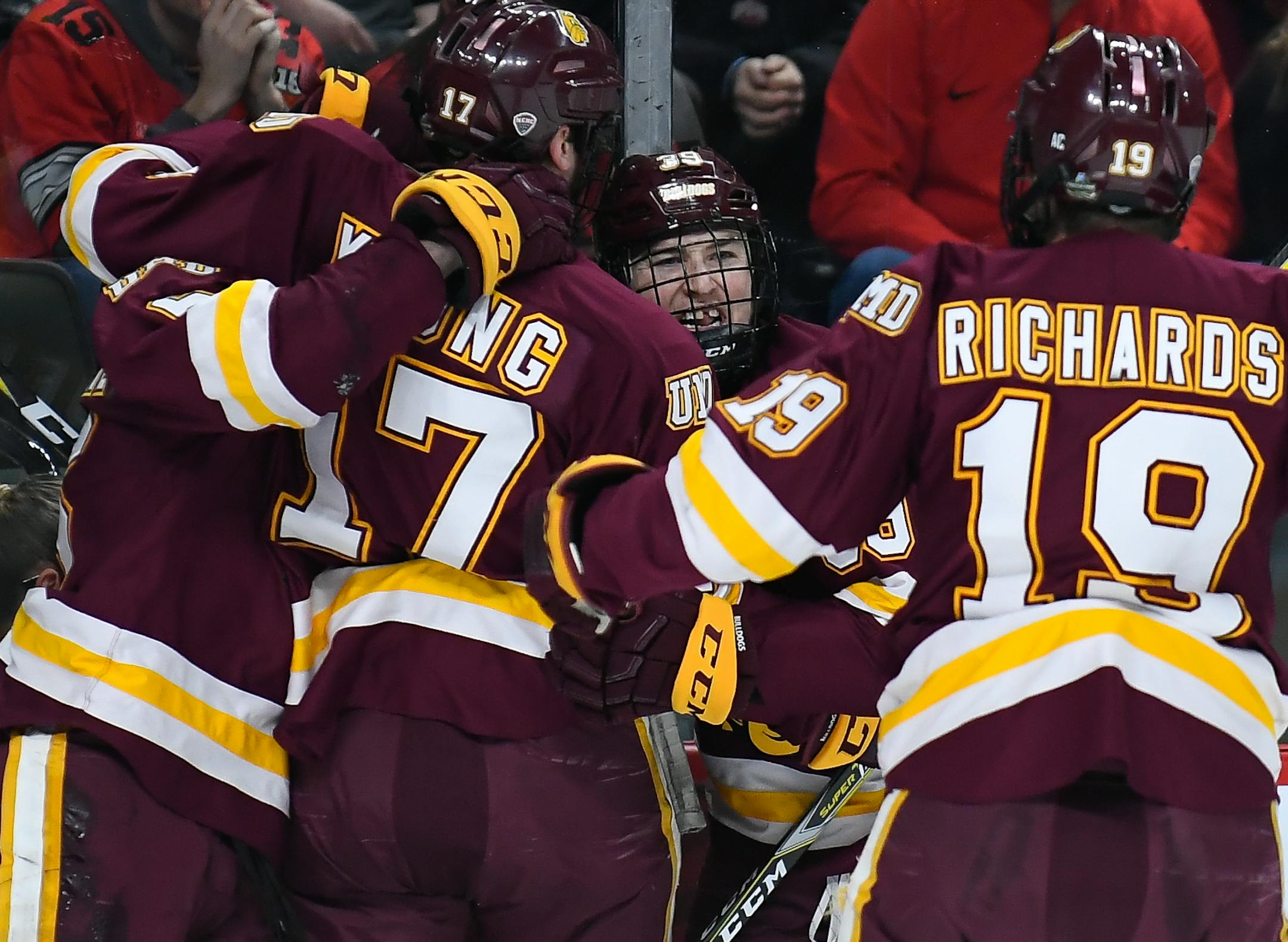 From left, Minnesota-Duluth Bulldogs defenseman Louie Roehl (6), forward Blake Young (17), forward Parker Mackay (39) and forward Justin Richards (19) celebrated a goal by Roehl in the first period against the Ohio State Buckeyes. ] AARON LAVINSKY &#xef; aaron.lavinsky@startribune.com University of Minnesota Duluth played Ohio State University in an NCAA Frozen Four semifinal game on Thursday, April 5, 2018 at Xcel Energy Center in St. Paul, Minn.
