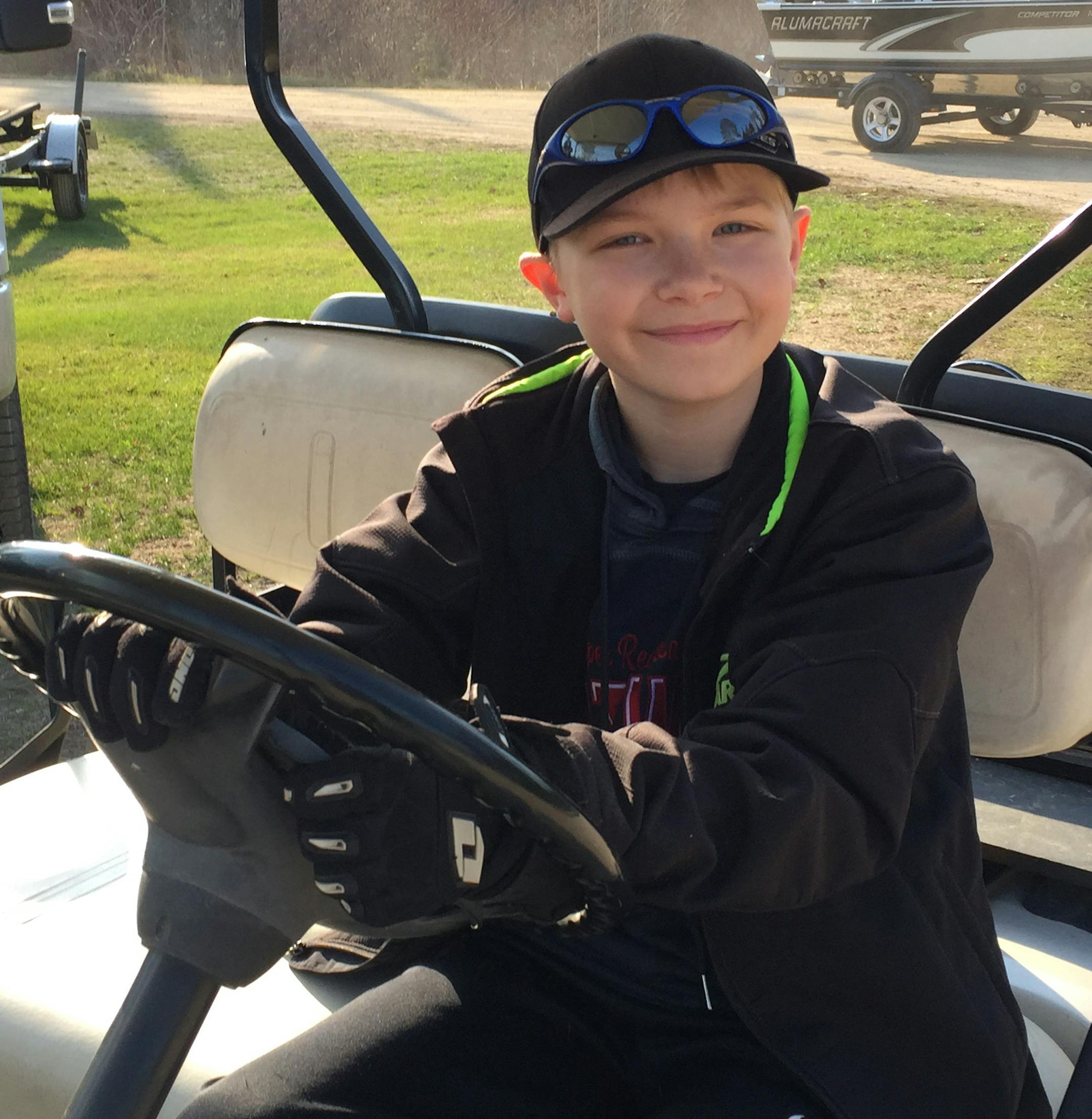 There are so many boats at Upper Red Lake for the 2019 fishing opener that you have to park so far away from the boat launch site that he brings you back after you launch. He is the most important person in the whole operation. His name is Jordan Waldo. Photo by Dennis Anderson