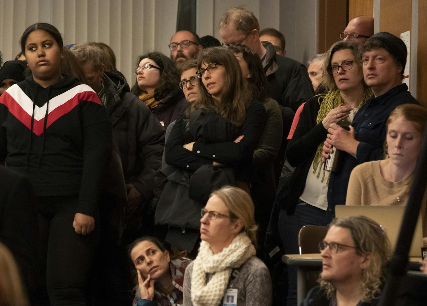 People stood in the back of the room when an overflow crowd attended the Minneapolis School Board meeting in Minneapolis, Minn., Tuesday, January 14, 2020. Many parents attended to voice their concerns about the district's strategic plan. ] RENEE JONES SCHNEIDER &#x2022; renee.jones@startribune.com