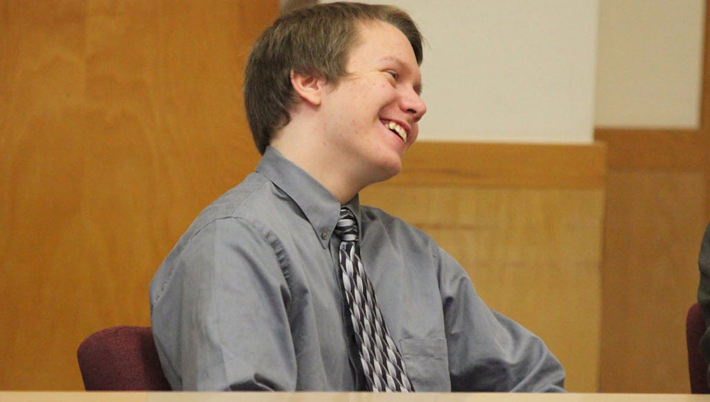 Michael Swanson smiles as the judge reads his guilty verdict Thursday for both murder and robbery in the first degreee.