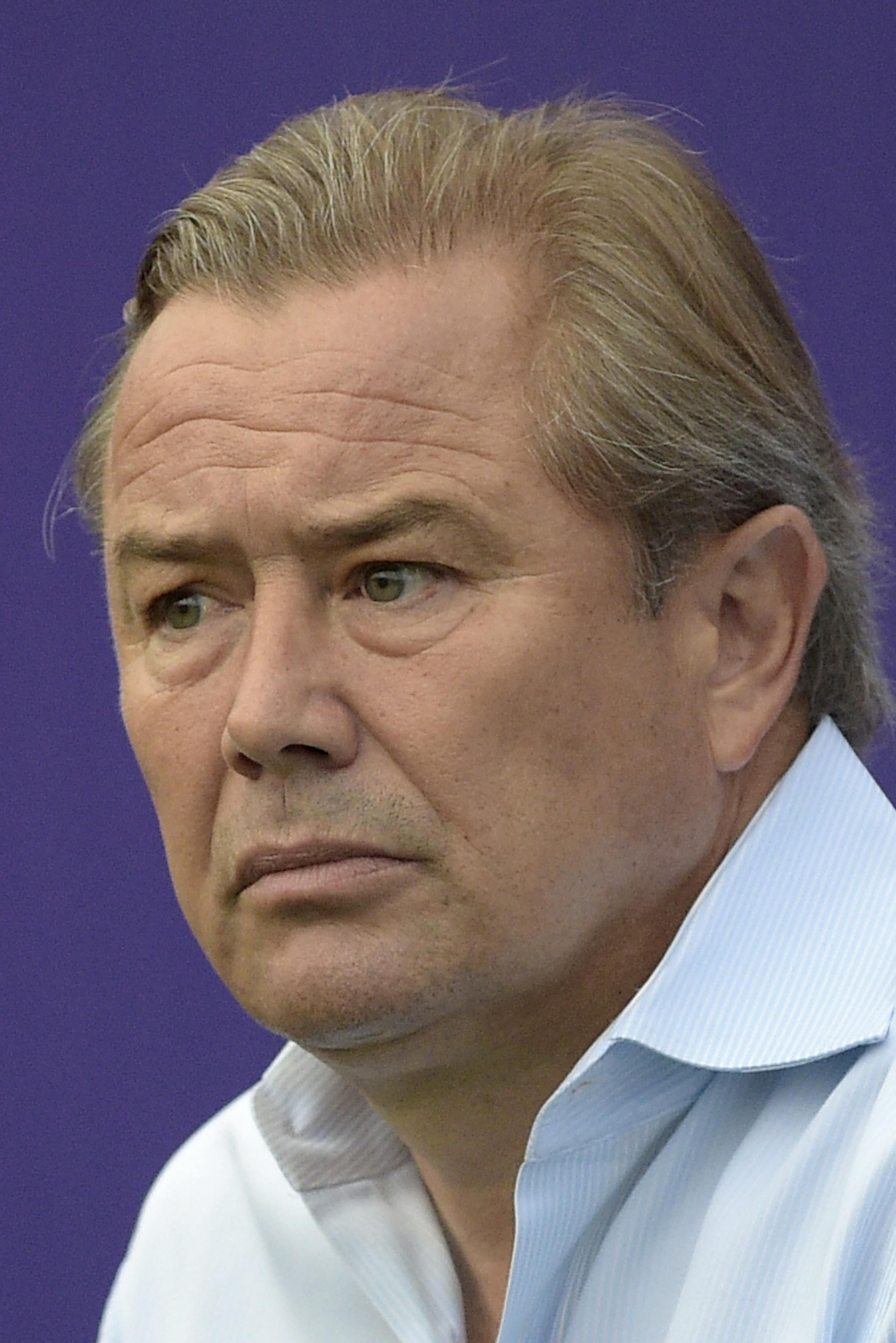 Orlando City head coach Adrian Heath watches from the bench before an MLS soccer match against the Columbus Crew in Orlando, Fla., Saturday, Aug. 1, 2015. (AP Photo/Phelan M. Ebenhack) ORG XMIT: OTKCREW276