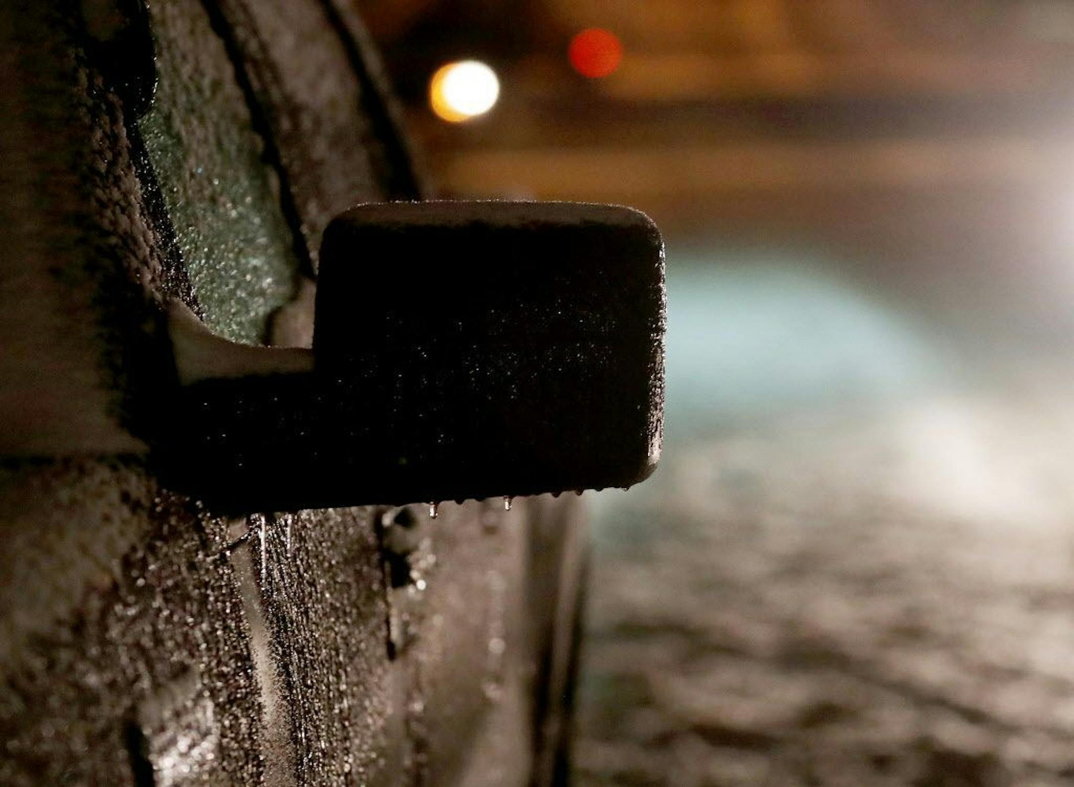 A truck along E. 42nd Street near 3rd Ave. S. bears the icy evidence of an overnight/early morning ice storm that made driving treacherous during the Tuesday morning commute for many motorists in the Twin Cities.